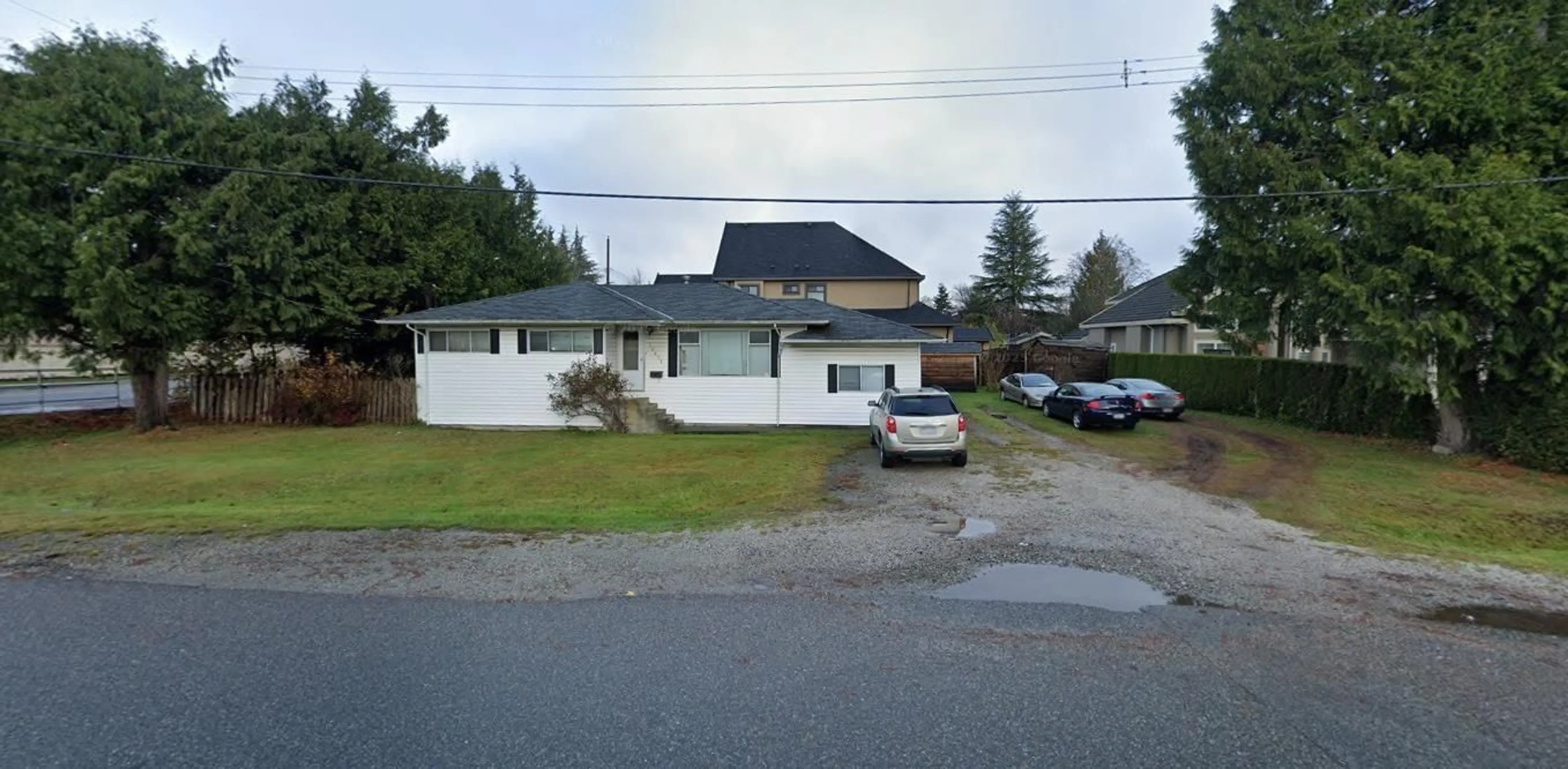 A pic from outside/outdoor area/front of a property/back of a property/a pic from drone, street for 12411 78, Surrey British Columbia V3W2X5