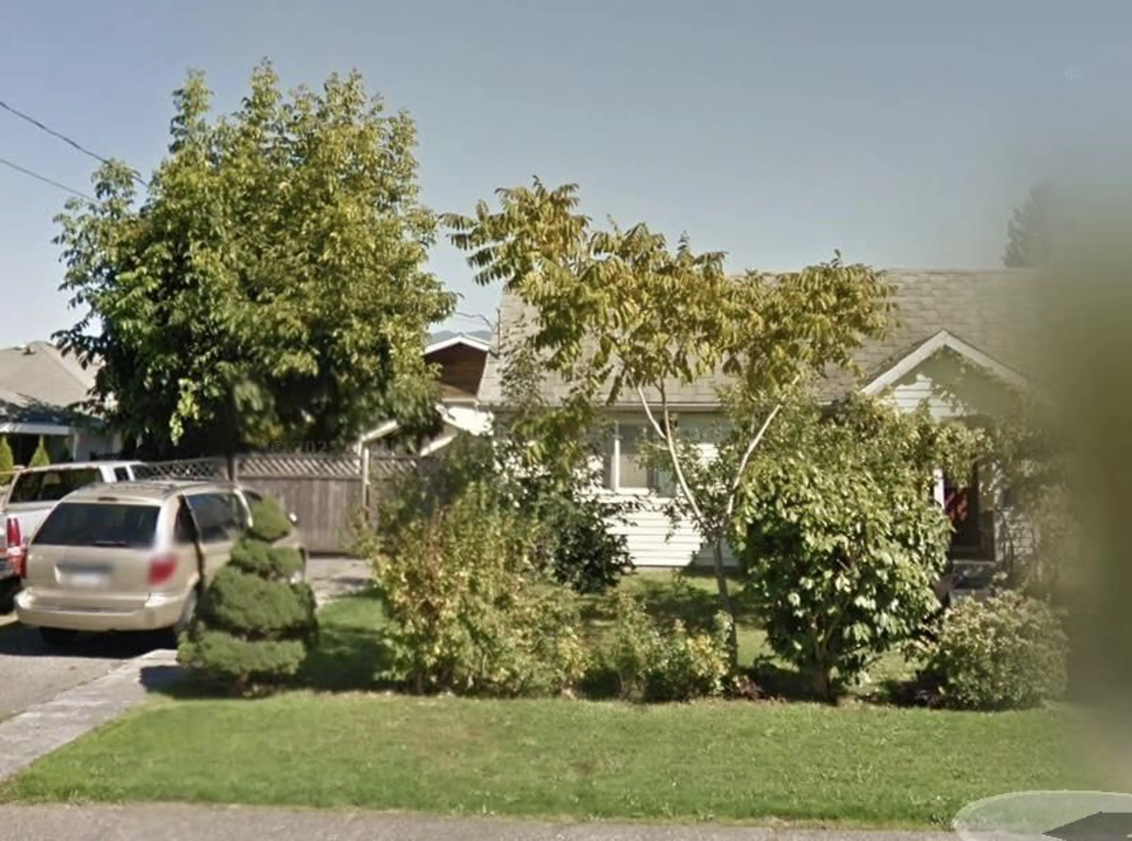 A pic from outside/outdoor area/front of a property/back of a property/a pic from drone, street for 9406 WOODBINE STREET, Chilliwack British Columbia V2P5S4