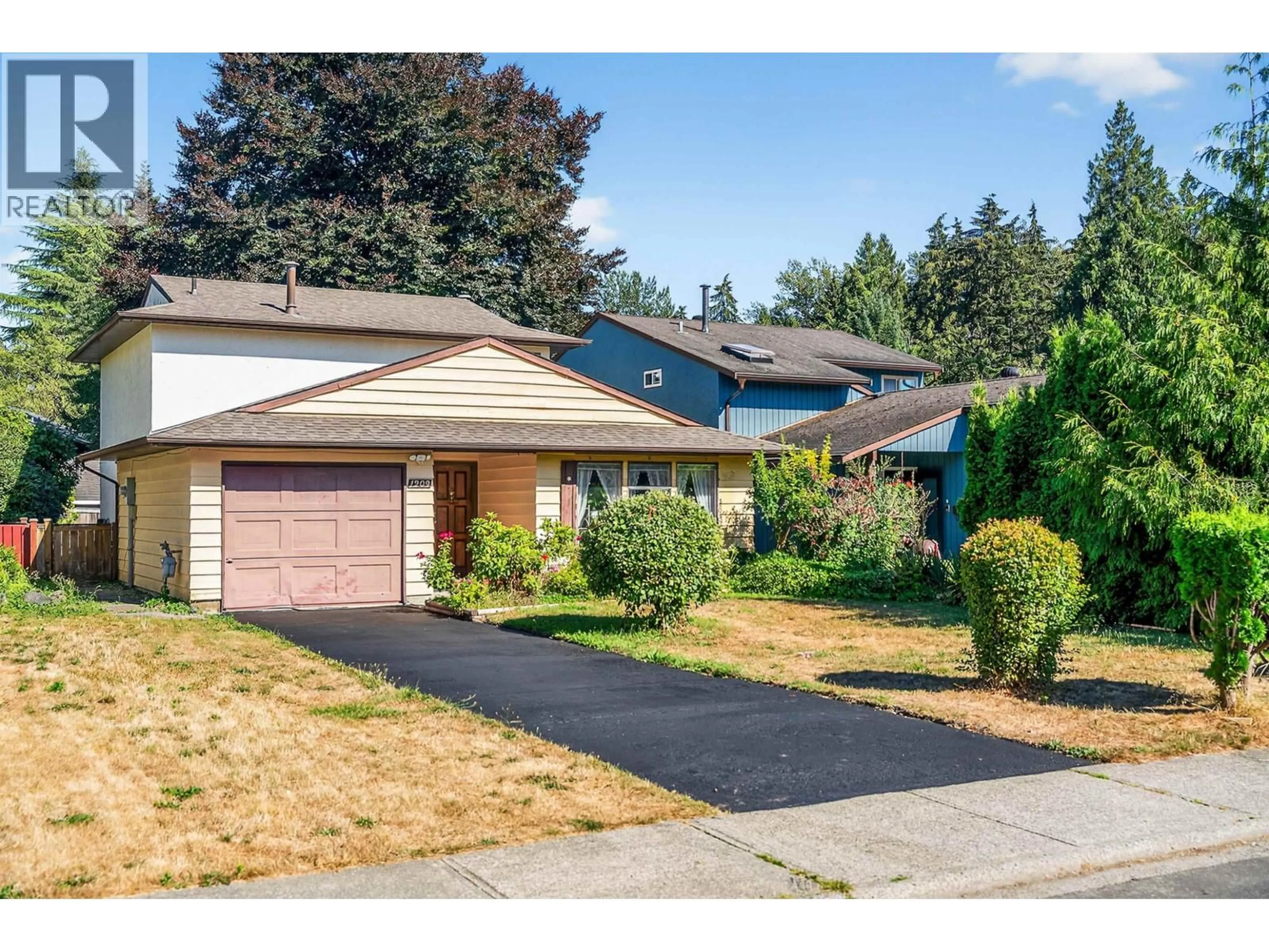 Home with vinyl exterior material, street for 1209 NESTOR STREET, Coquitlam British Columbia V3E1H3
