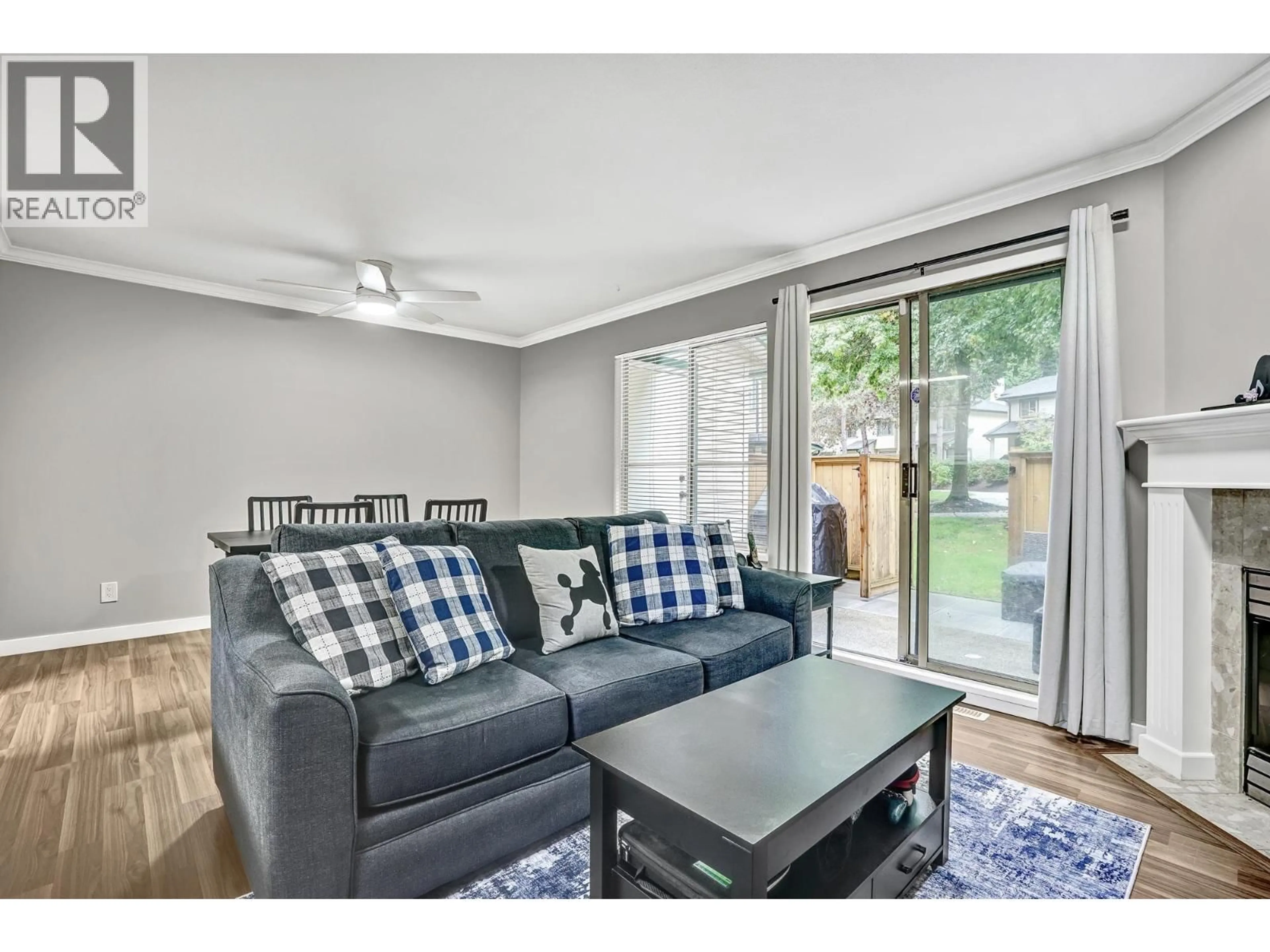 Living room with furniture, wood/laminate floor for 31 - 21960 RIVER ROAD, Maple Ridge British Columbia V2X2C3