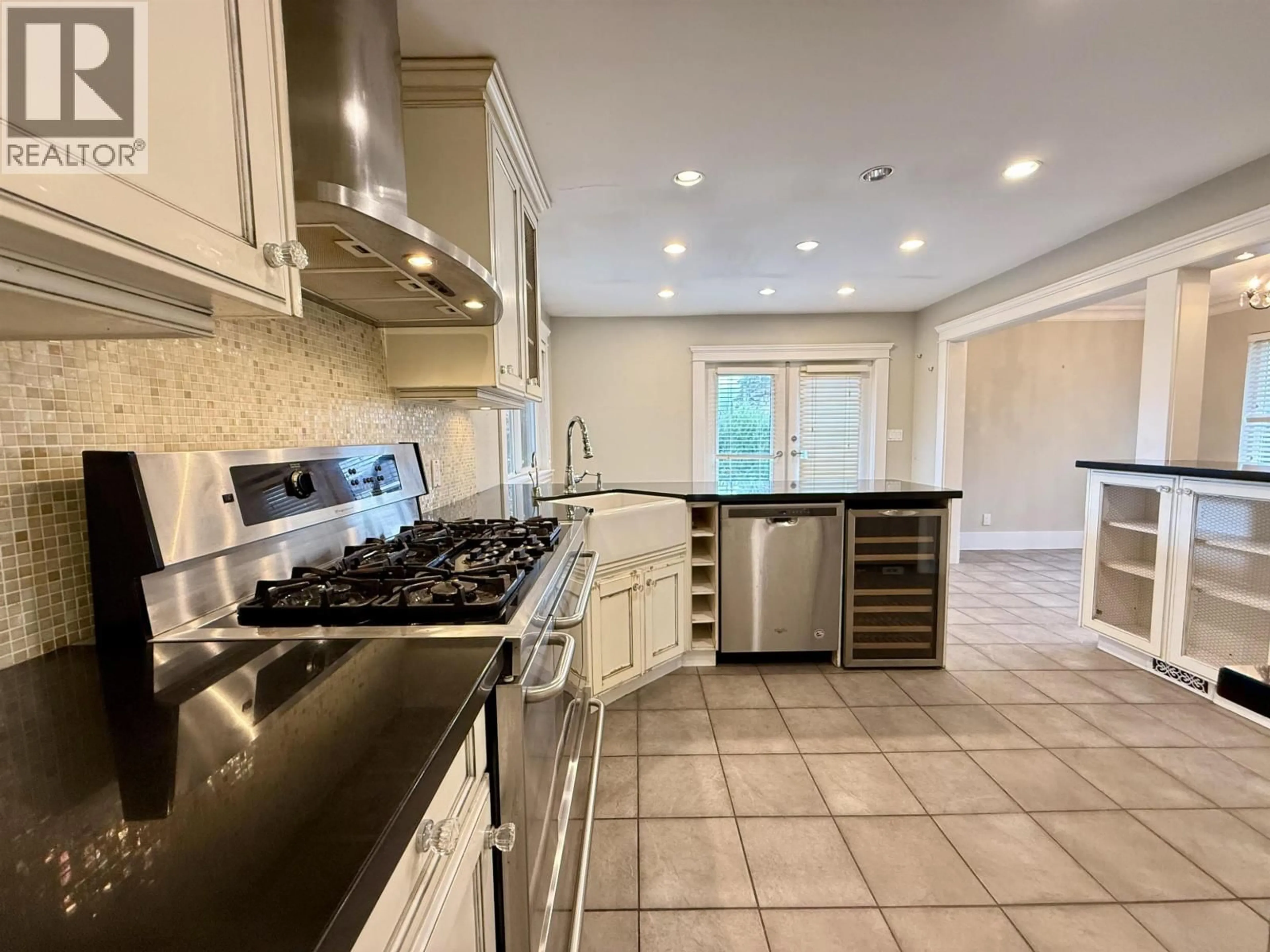 Open concept kitchen, ceramic/tile floor for 6525 CARNEGIE STREET, Burnaby British Columbia V5B1Y2