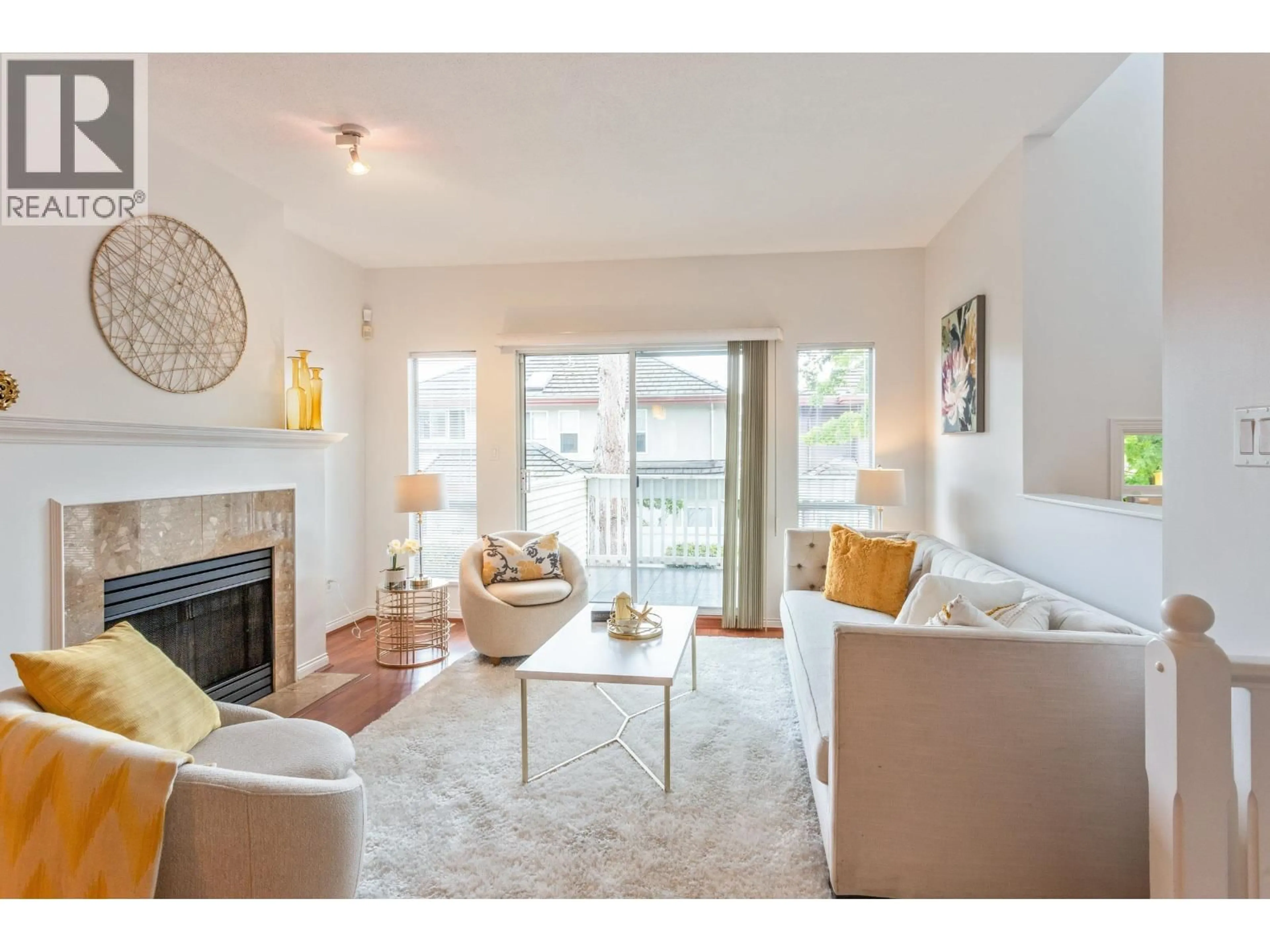 Living room with furniture, wood/laminate floor for 11 - 12500 MCNEELY DRIVE, Richmond British Columbia V6V2S4