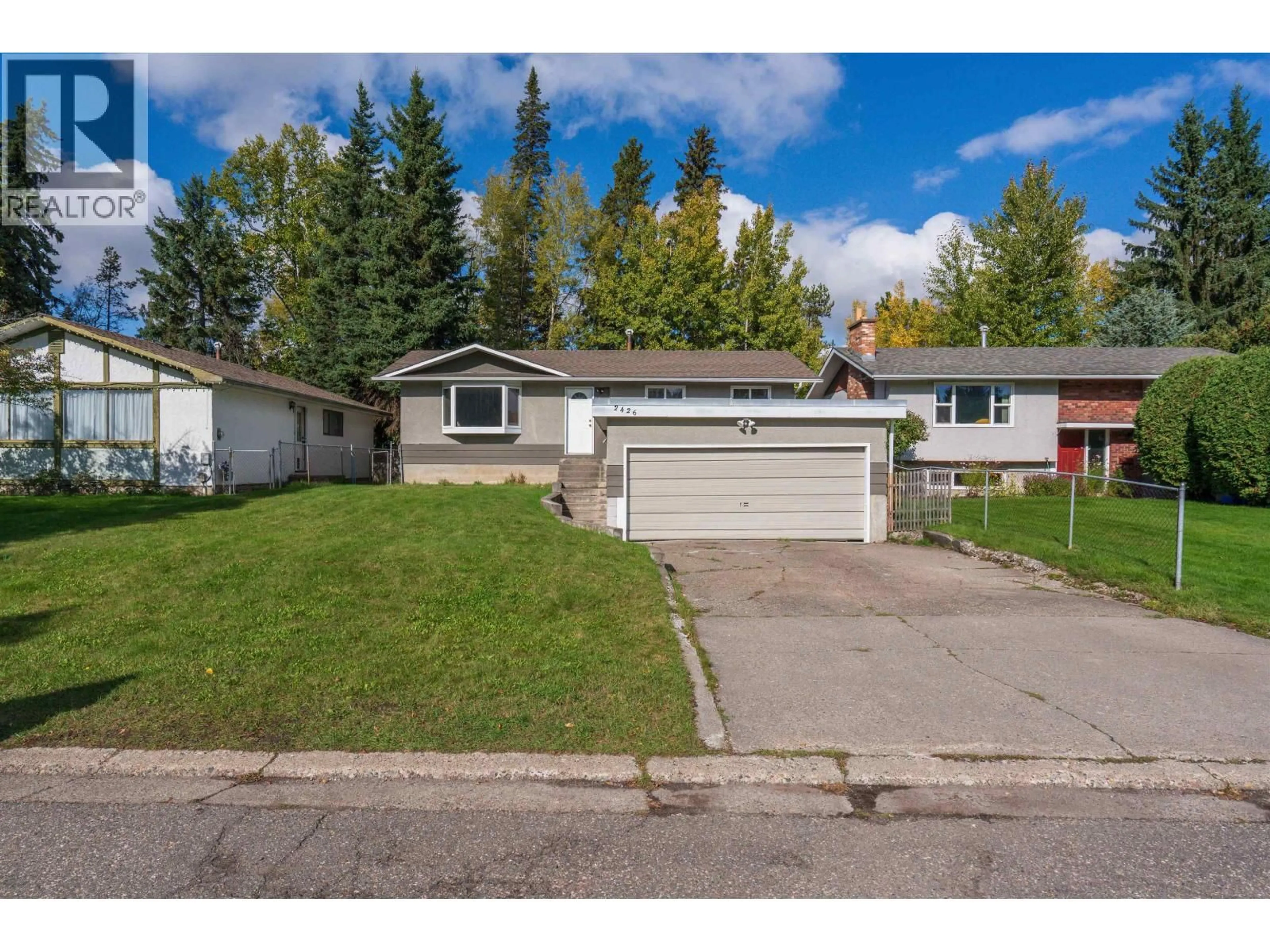 Home with vinyl exterior material, street for 2426 LISGAR CRESCENT, Prince George British Columbia V2N1C3