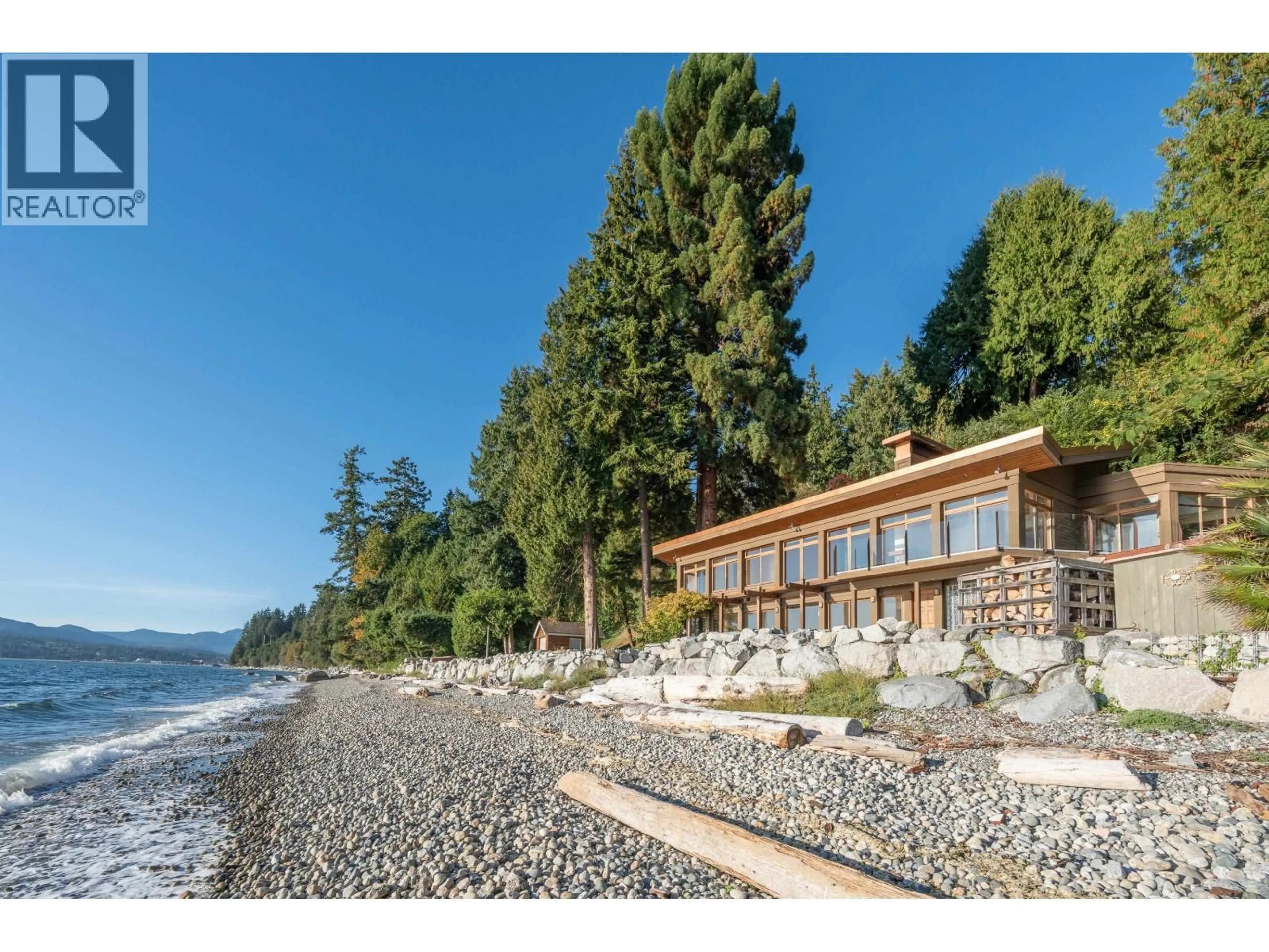 A pic from outside/outdoor area/front of a property/back of a property/a pic from drone, water/lake/river/ocean view for 4893 SUNSHINE COAST HIGHWAY, Sechelt British Columbia V7Z0B6