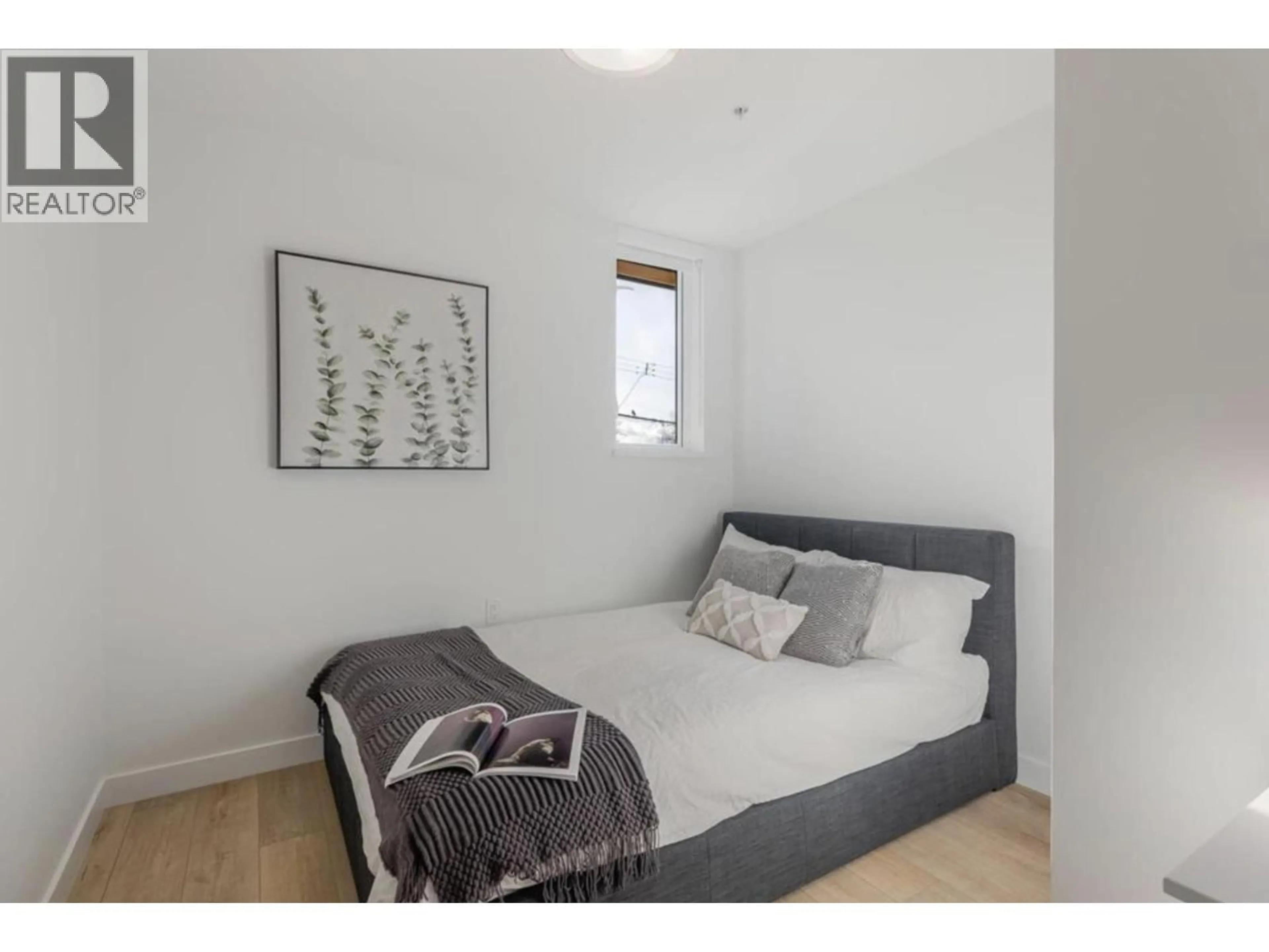 Bedroom with bed, unknown for 204 - 4933 CLARENDON STREET, Vancouver British Columbia V5R3J3