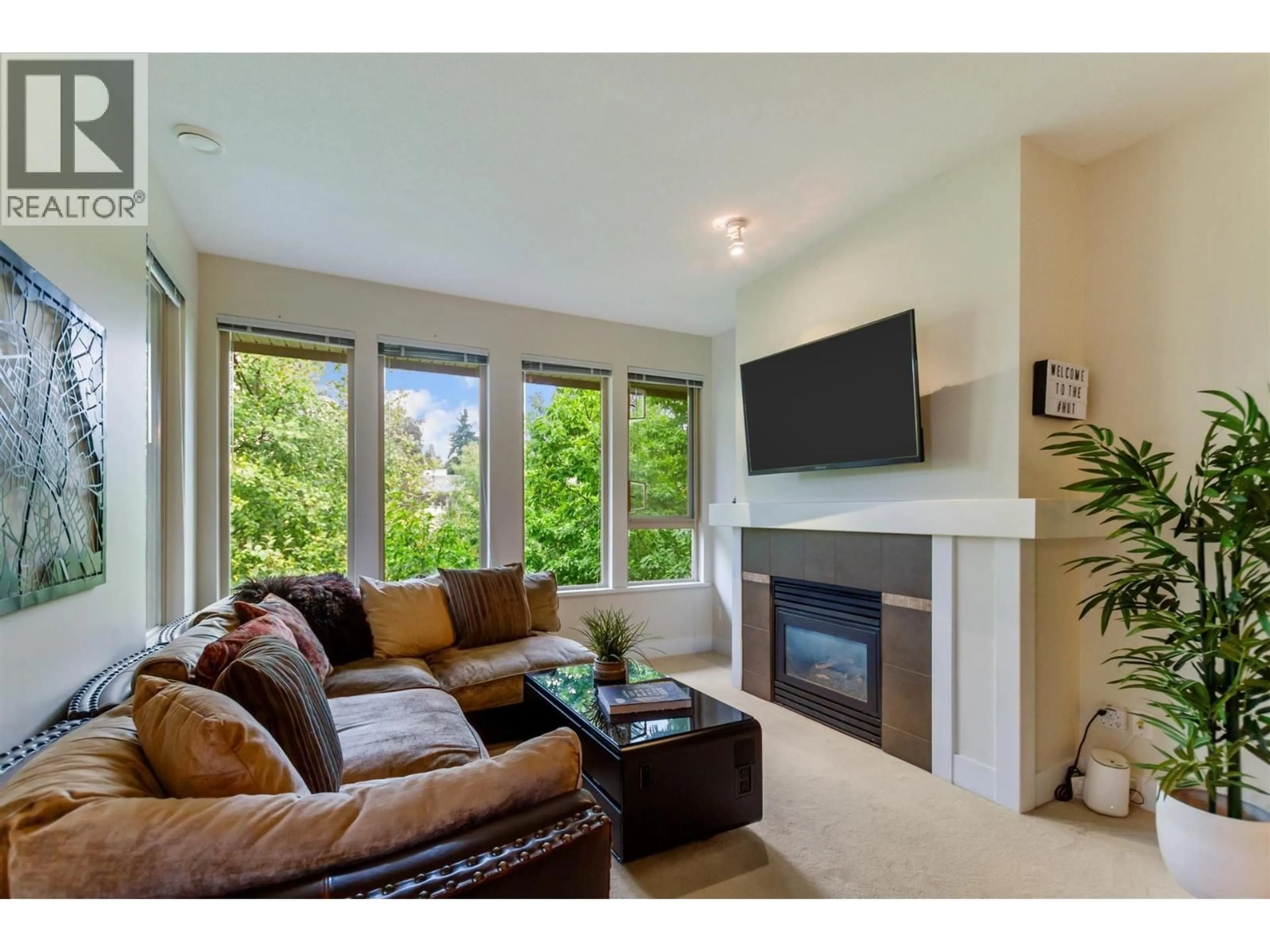 Living room with furniture, wood/laminate floor for 404 - 2388 WESTERN PARKWAY, Vancouver British Columbia V6T2K4
