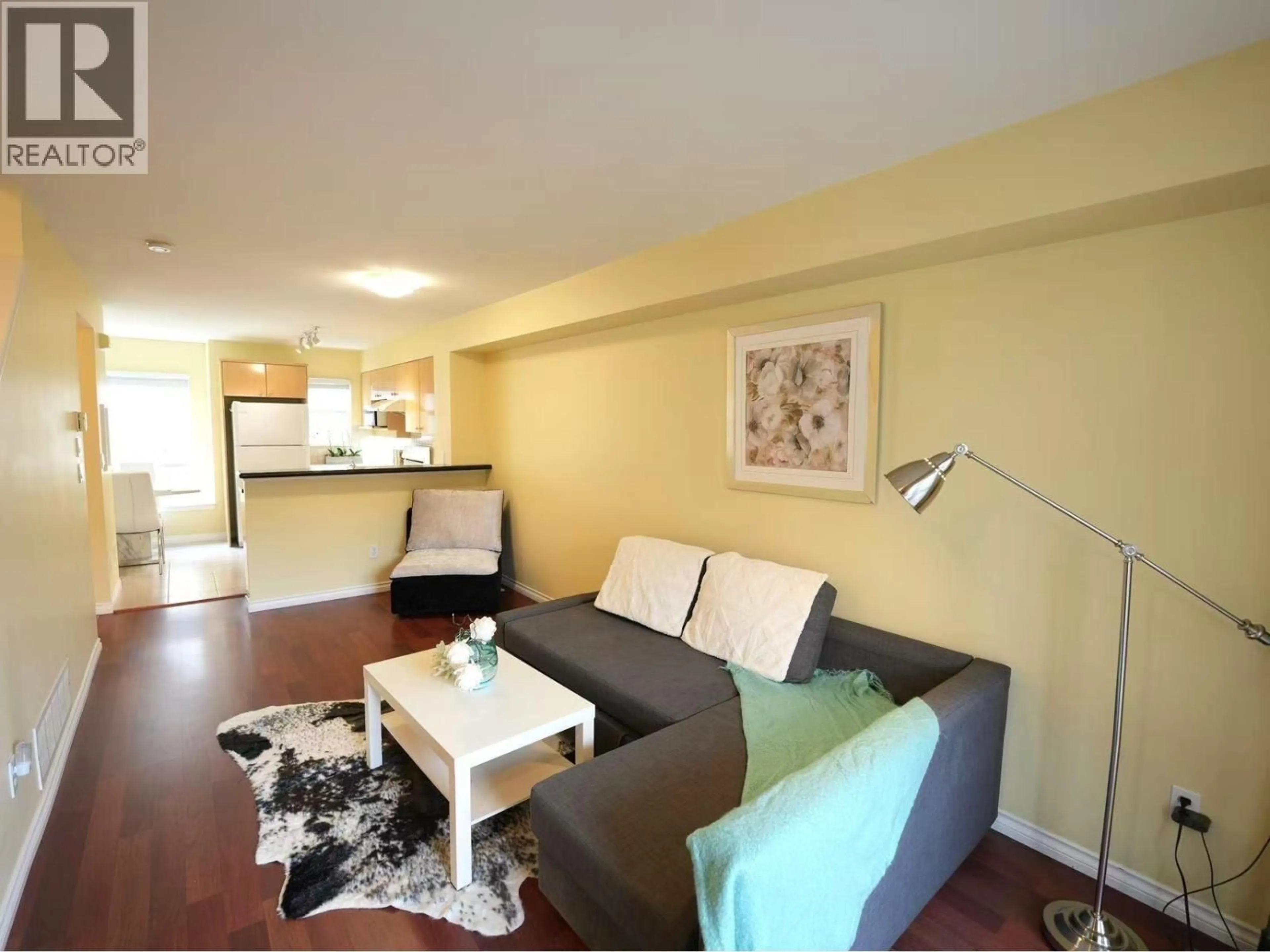 Living room with furniture, wood/laminate floor for 2 - 7100 LYNNWOOD DRIVE, Richmond British Columbia V7C5S8