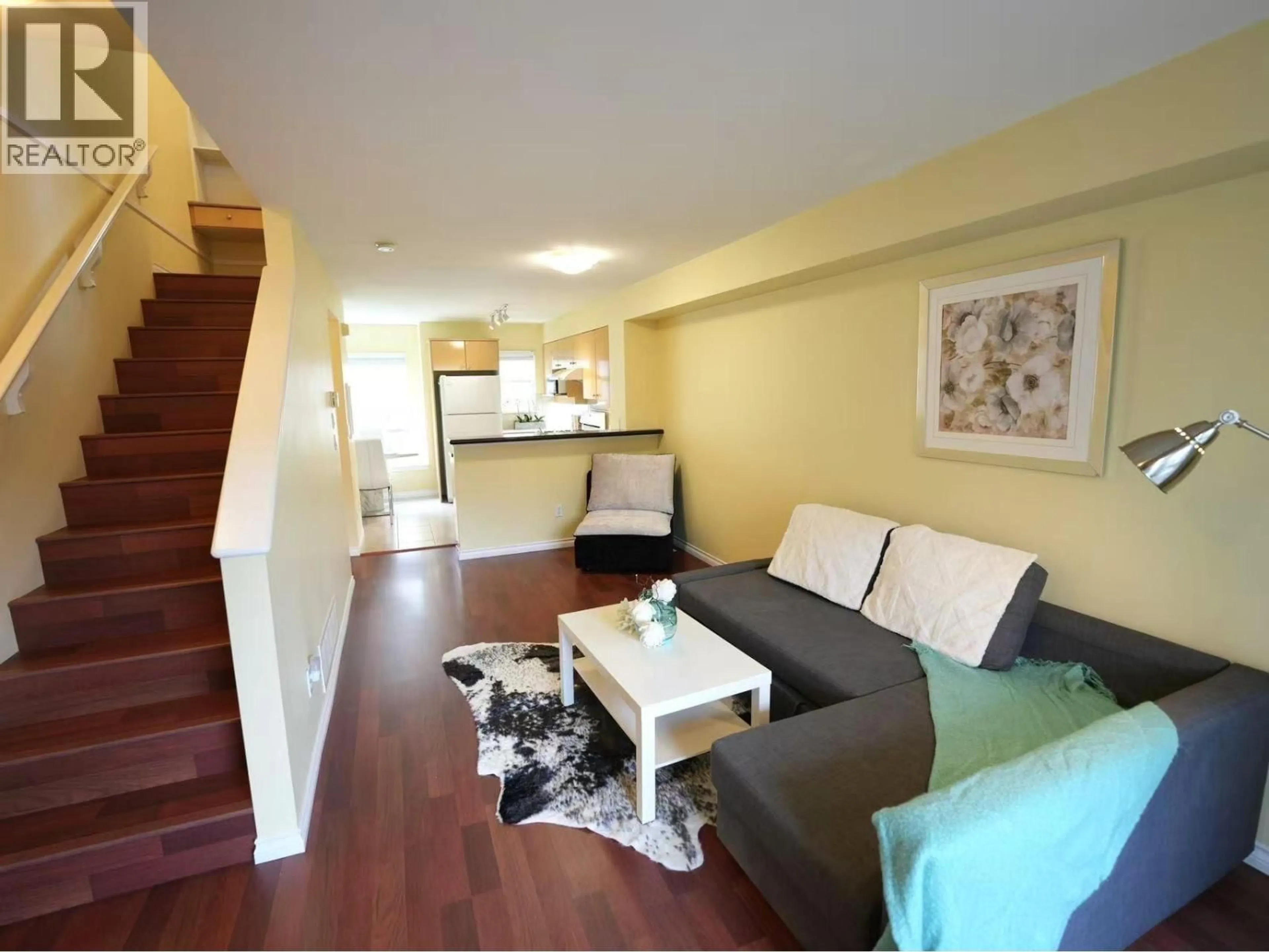 Living room with furniture, wood/laminate floor for 2 - 7100 LYNNWOOD DRIVE, Richmond British Columbia V7C5S8