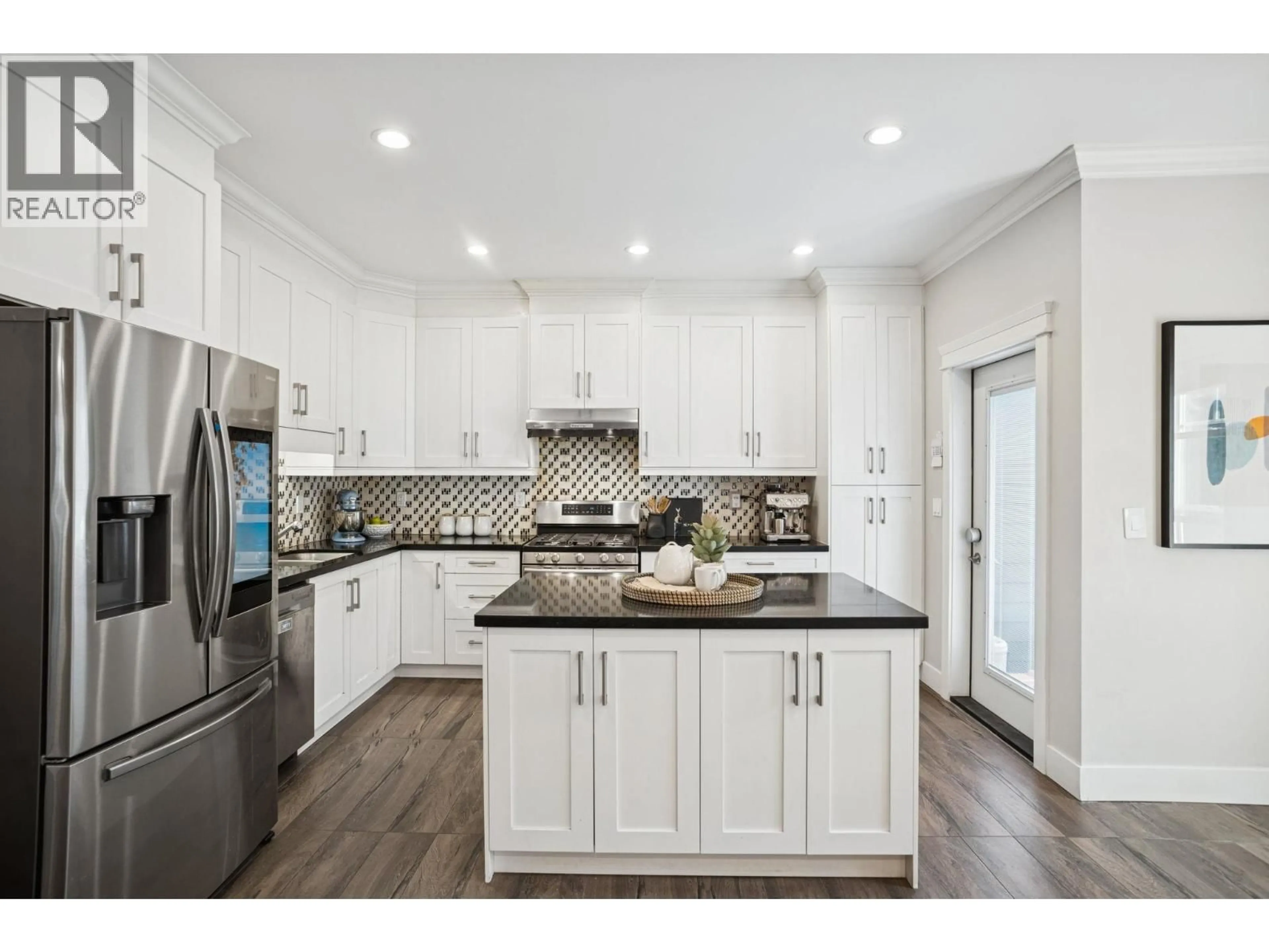 Open concept kitchen, unknown for 102 - 910 DELESTRE AVENUE, Coquitlam British Columbia V3K2G6