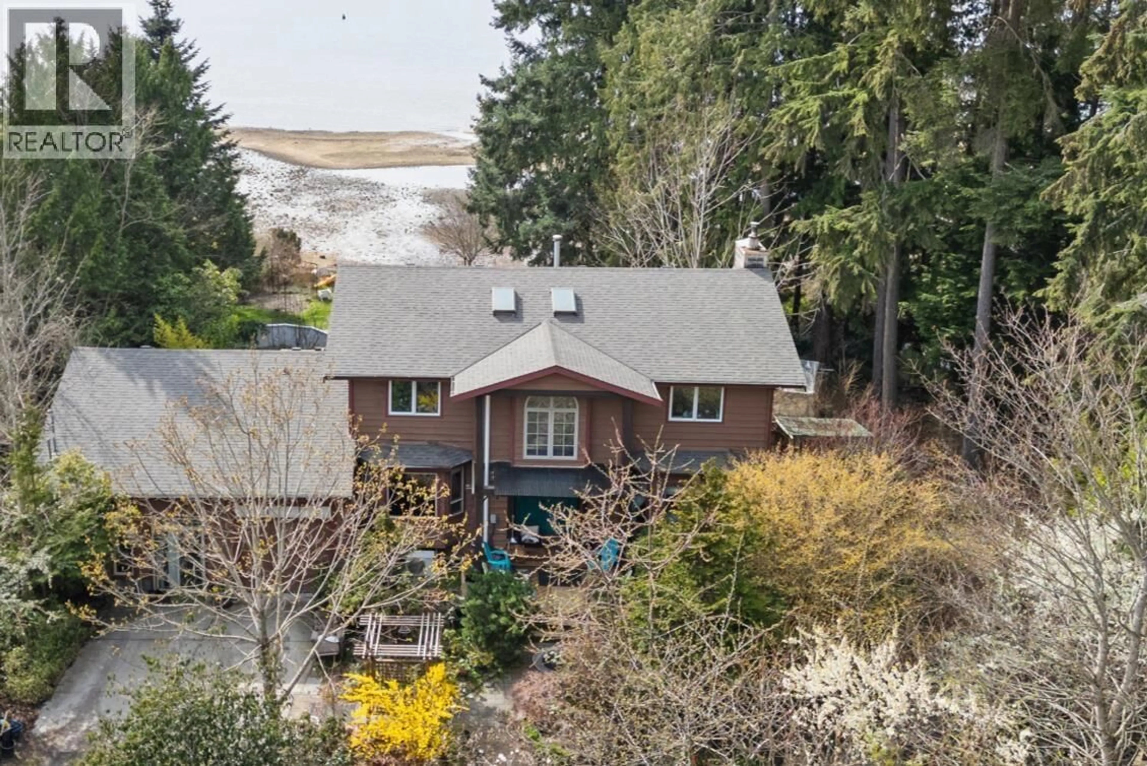 A pic from outside/outdoor area/front of a property/back of a property/a pic from drone, water/lake/river/ocean view for 6283 SECHELT INLET ROAD, Sechelt British Columbia V7Z0L3