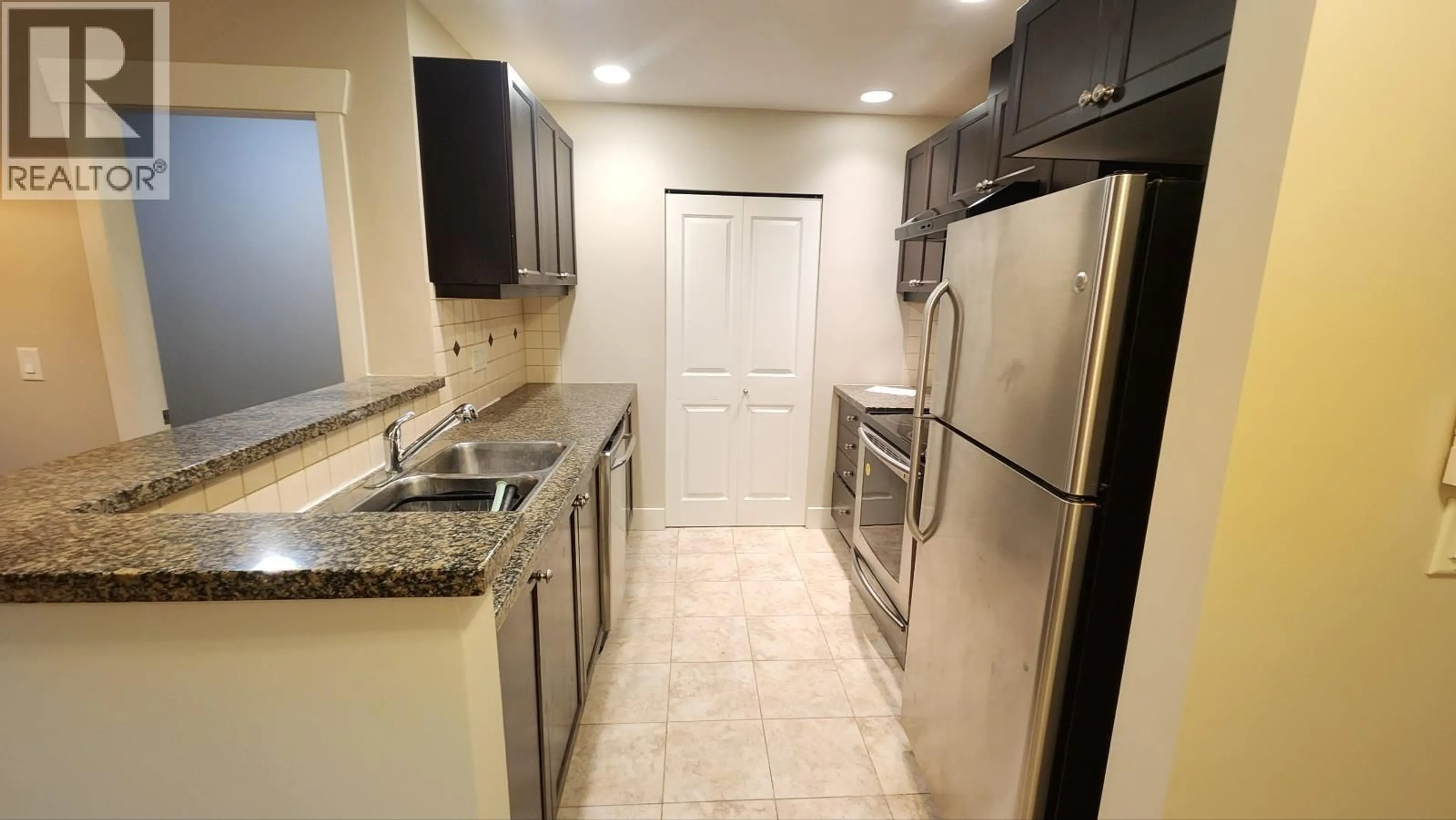 Standard kitchen, ceramic/tile floor for 114 - 6279 EAGLES DRIVE, Vancouver British Columbia V6T2K7