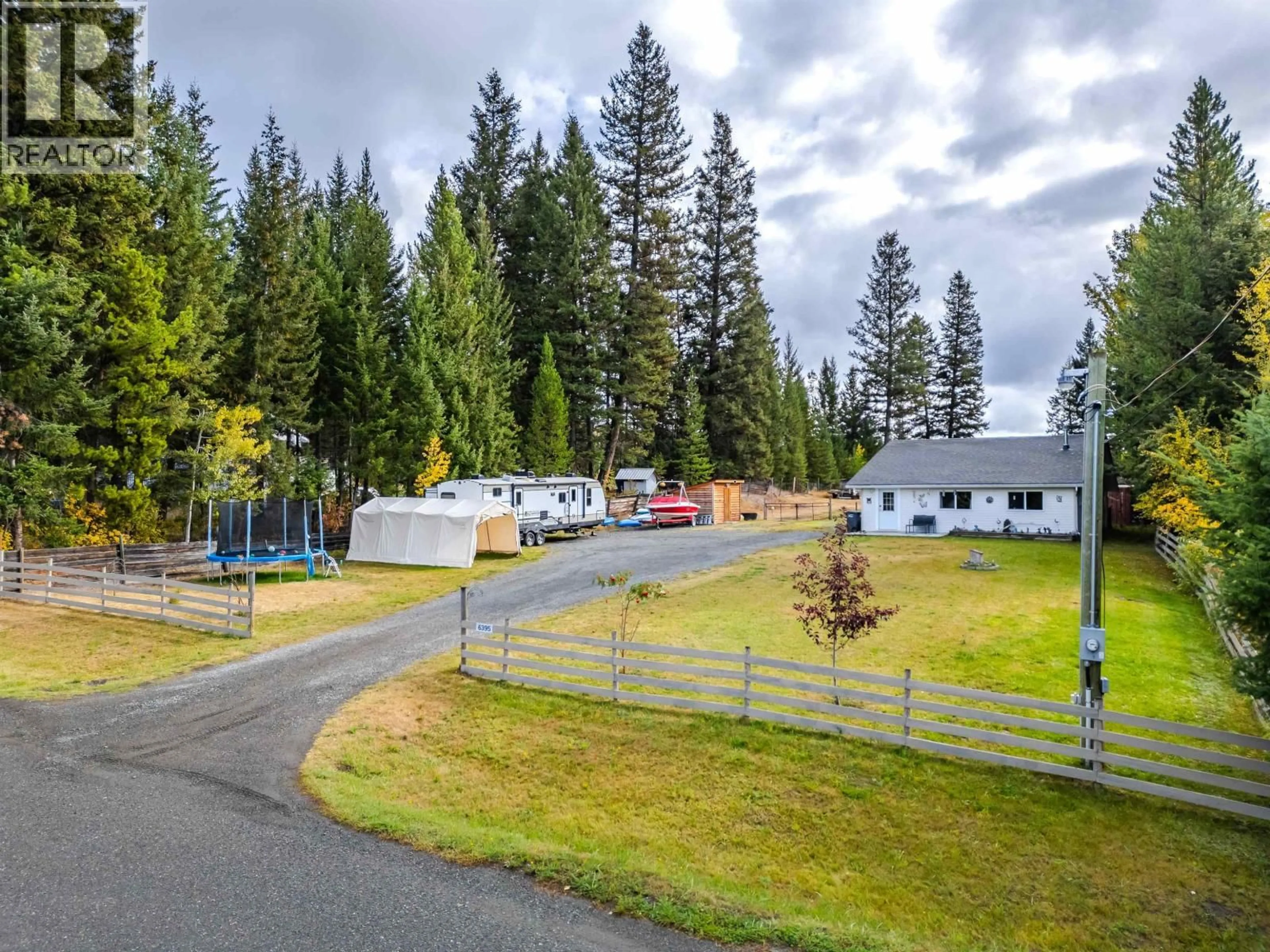 A pic from outside/outdoor area/front of a property/back of a property/a pic from drone, mountain view for 6395 YOUNG ROAD, Horse Lake British Columbia V0K2E3