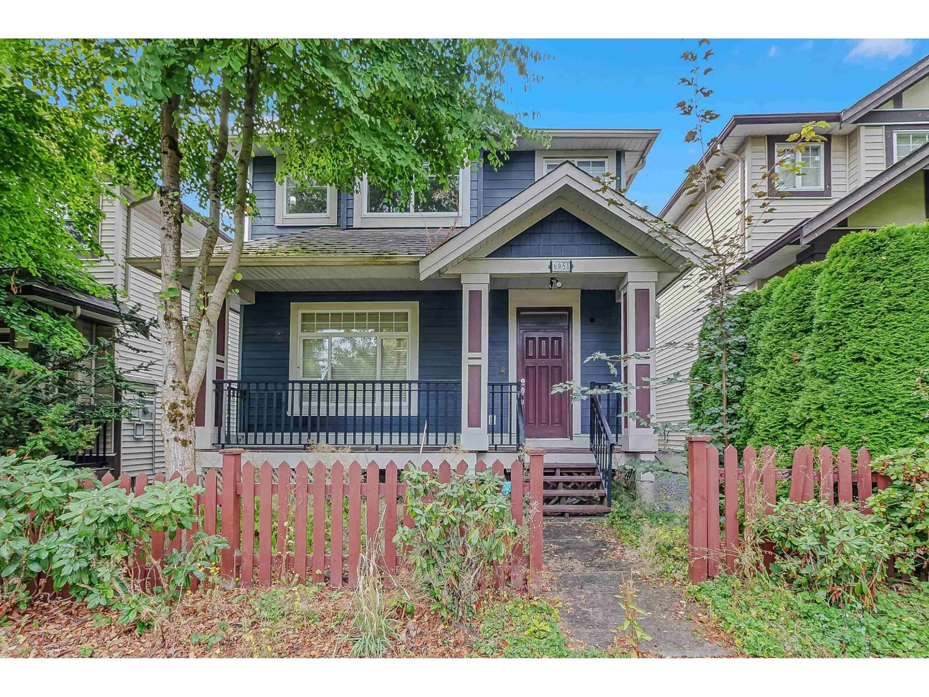 Home with vinyl exterior material, street for 6951 196 STREET, Surrey British Columbia V4N5Z1