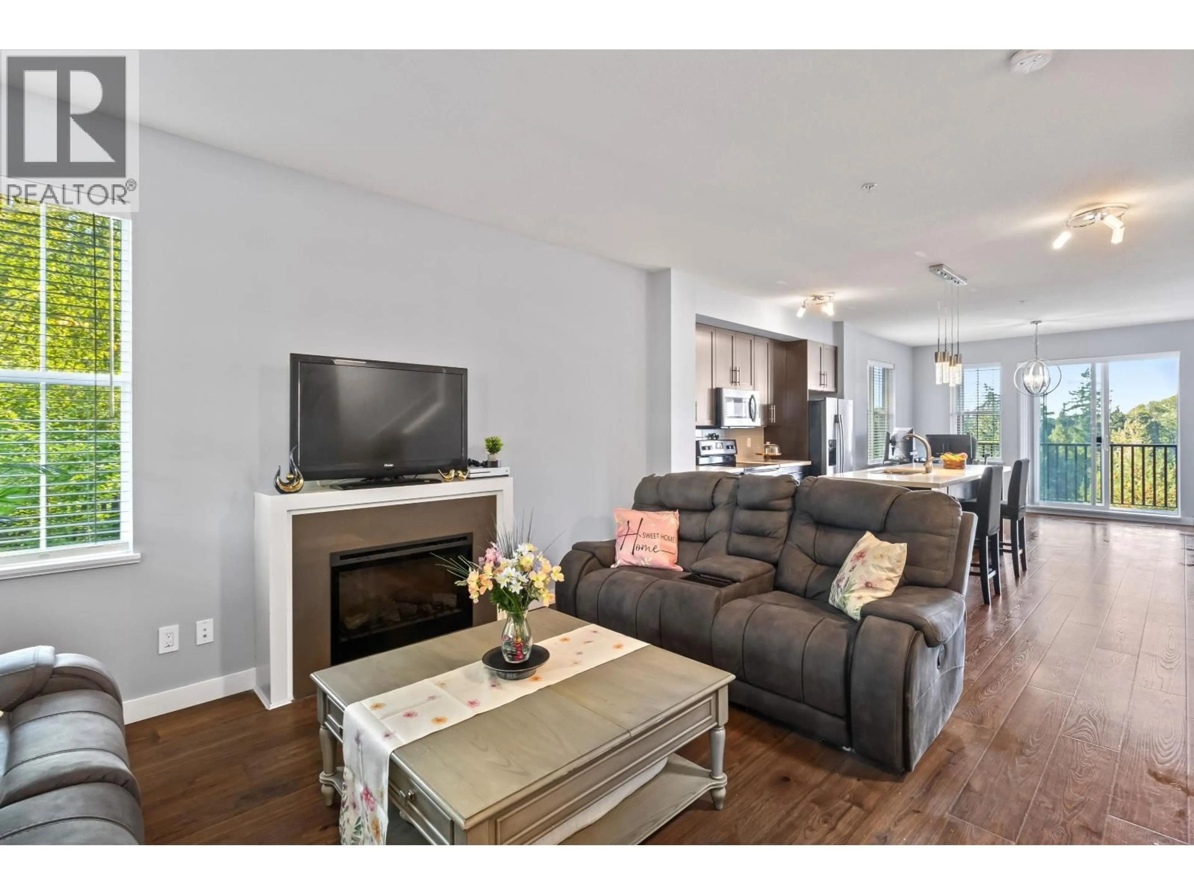 Living room with furniture, wood/laminate floor for 16 - 11176 GILKER HILL ROAD, Maple Ridge British Columbia V2W0G5