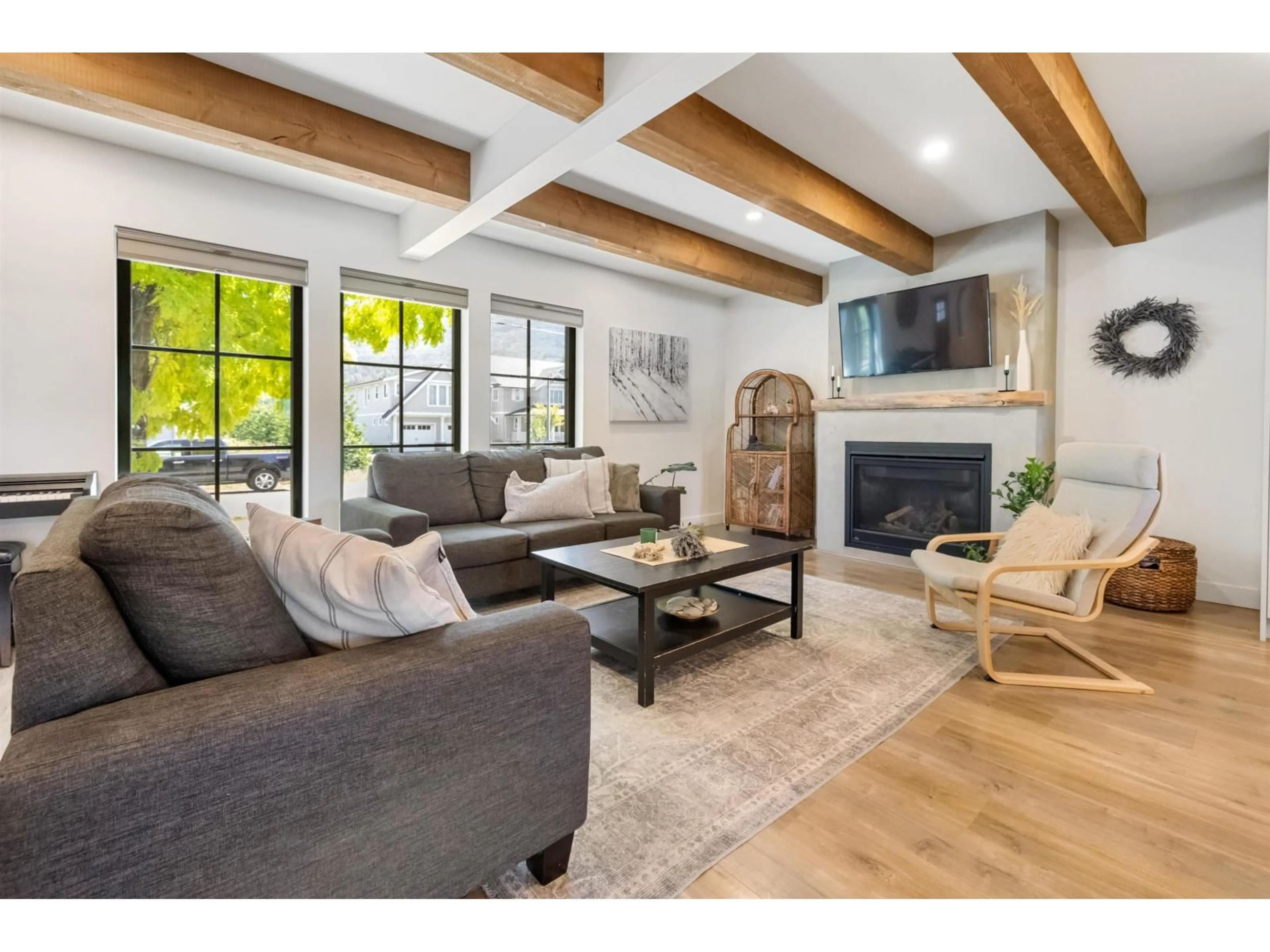 Living room with furniture, wood/laminate floor for 3995 STEWART ROAD, Yarrow British Columbia V2R5G7