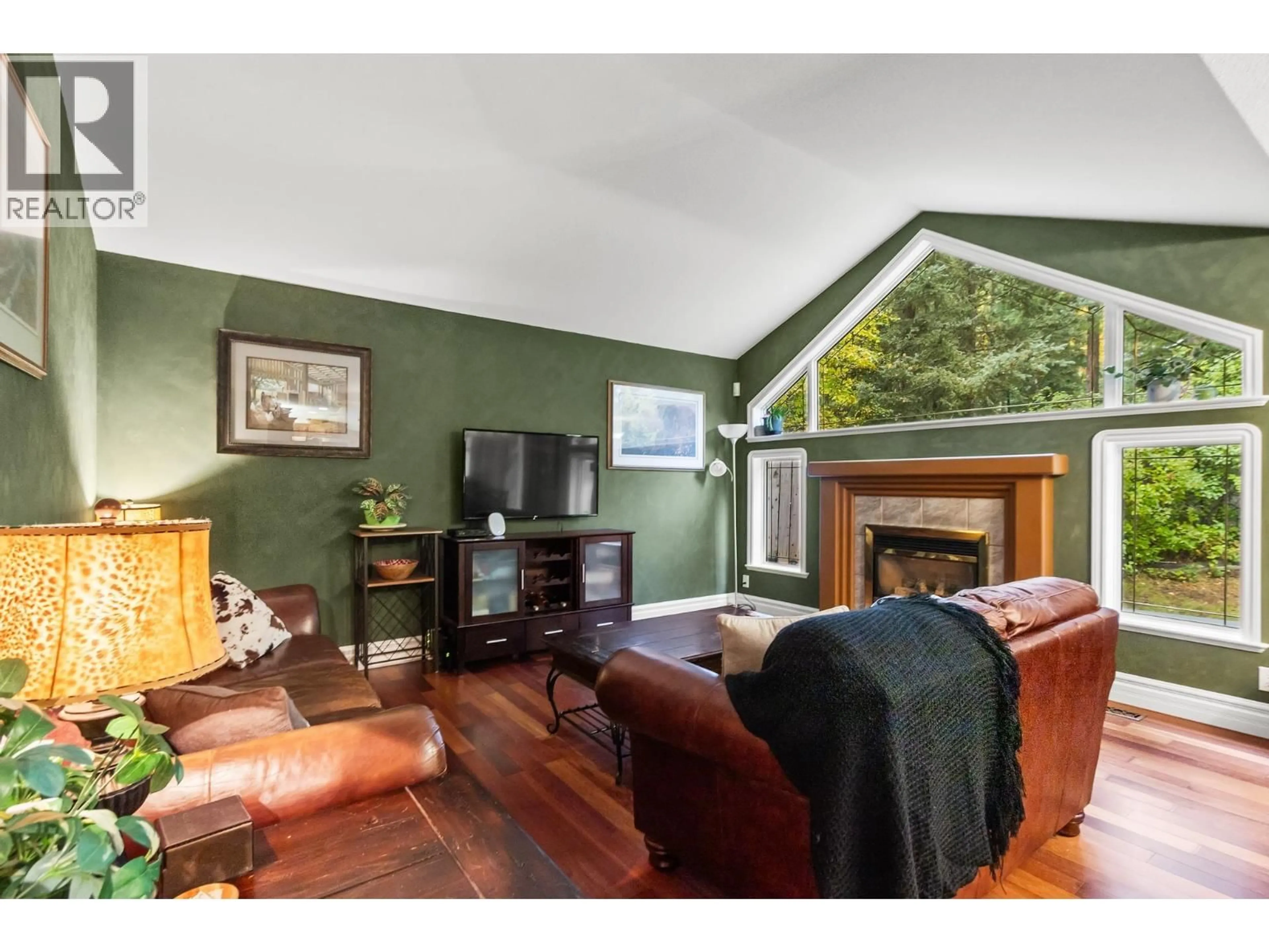 Living room with furniture, wood/laminate floor for 7280 NORTH NECHAKO ROAD, Prince George British Columbia V2K4Z5