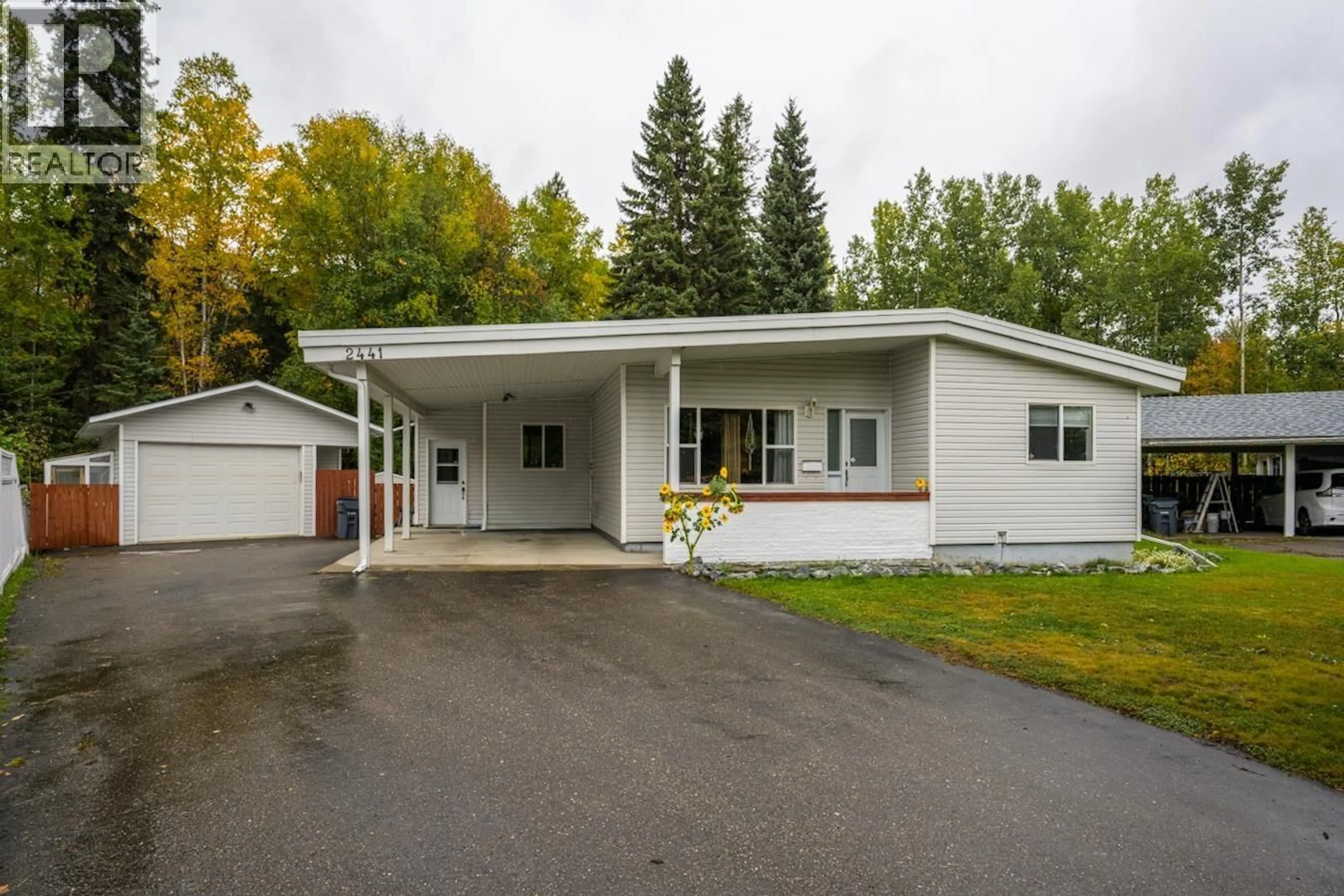 Home with vinyl exterior material, street for 2441 LISGAR CRESCENT, Prince George British Columbia V2N1C4