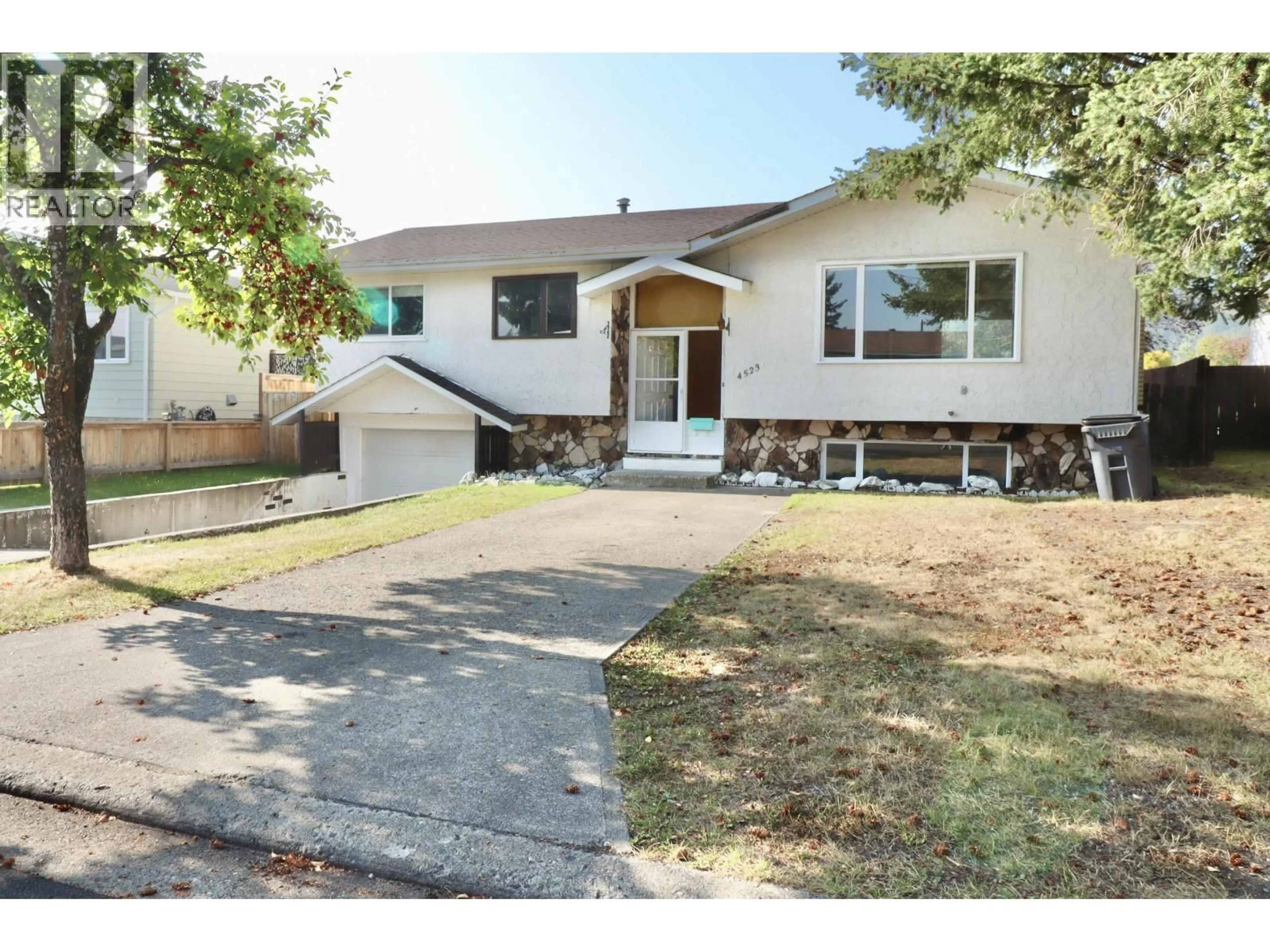 Home with vinyl exterior material, street for 4523 HUNTER AVENUE, Prince George British Columbia V2M5V7