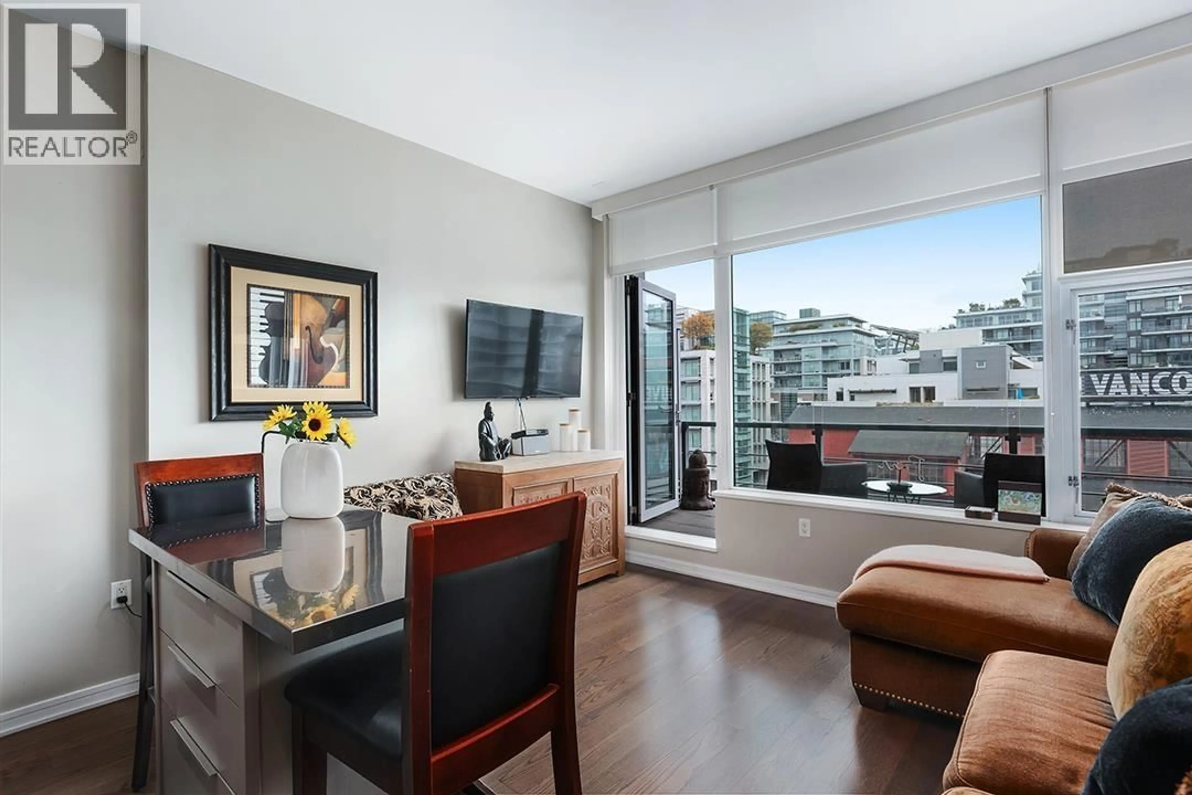 Living room with furniture, wood/laminate floor for 605 - 123 1ST AVENUE, Vancouver British Columbia V5Y0E2