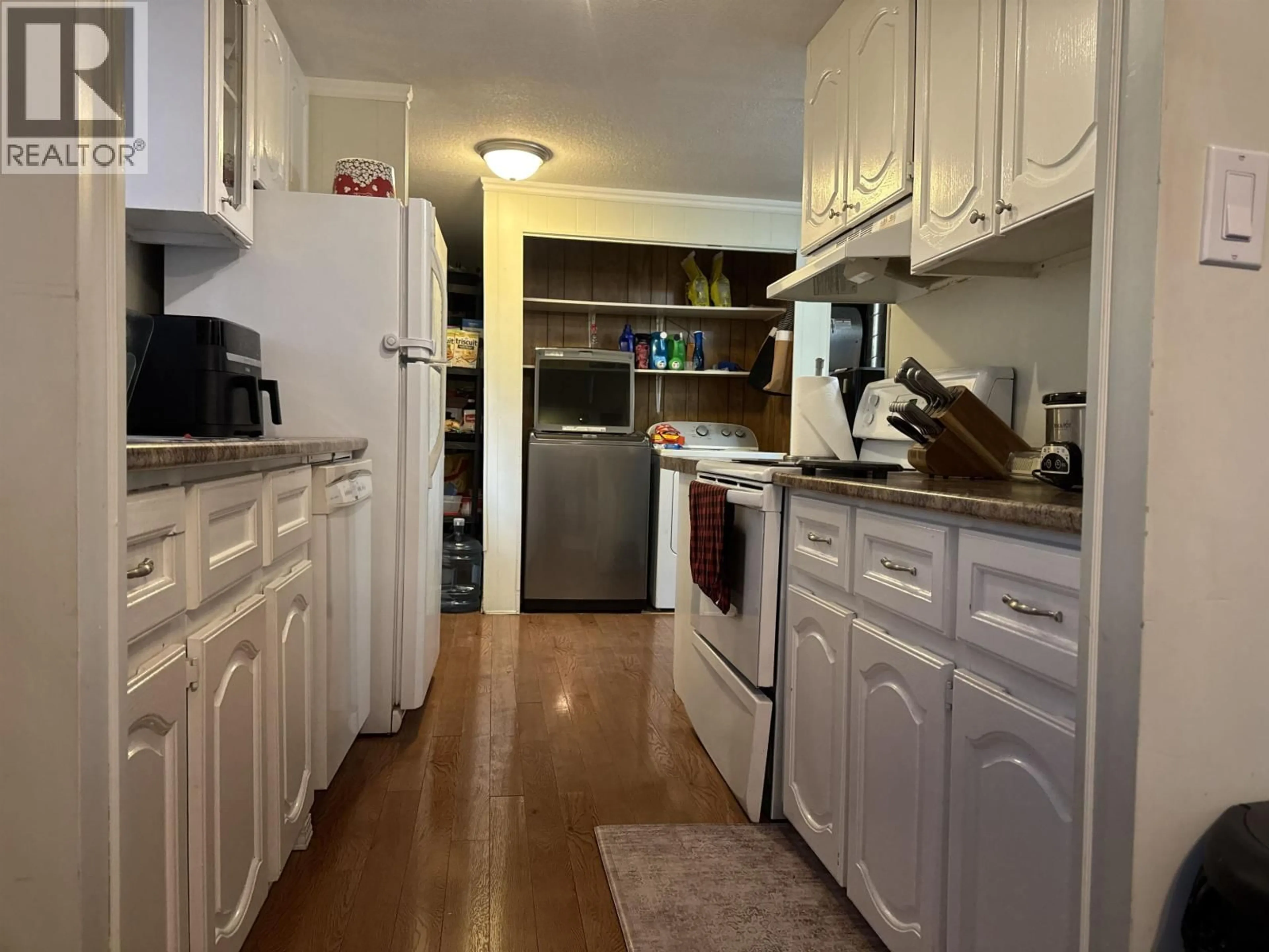 Standard kitchen, wood/laminate floor for 9616 81 STREET, Fort St. John British Columbia V1J4S5