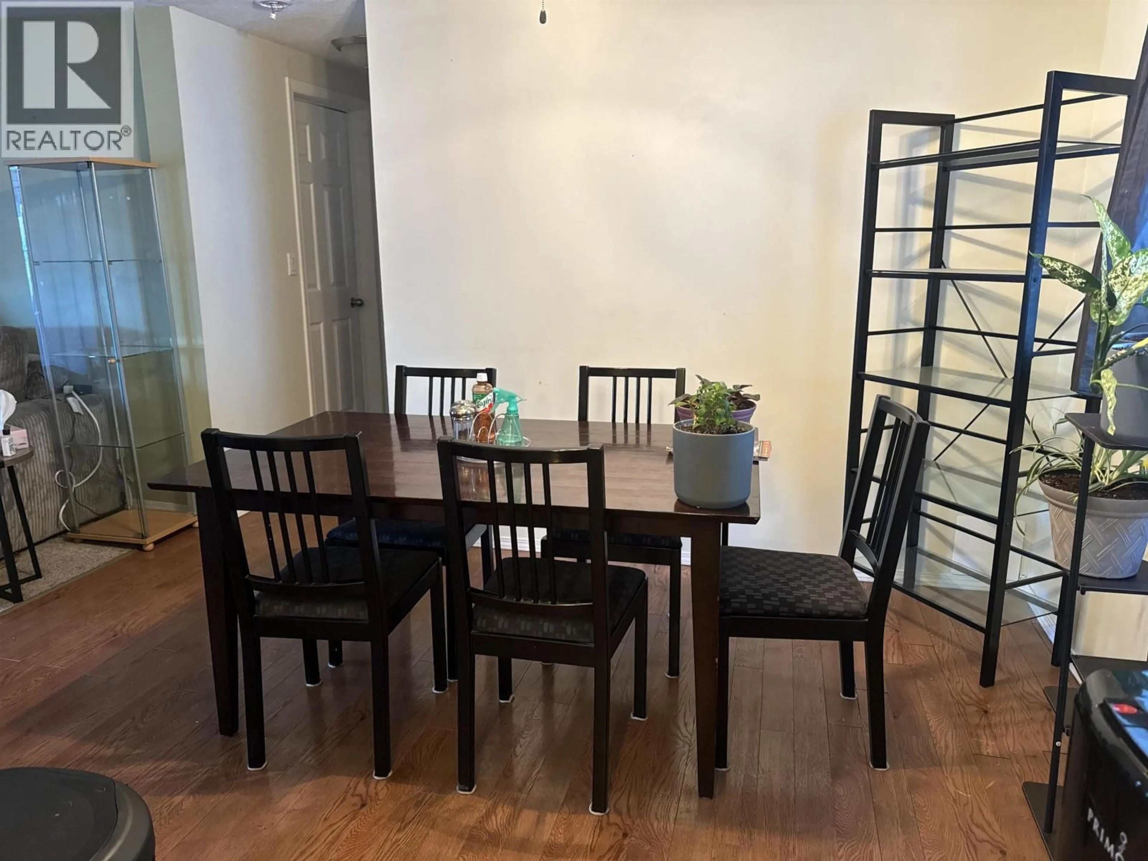 Dining room, wood/laminate floor for 9616 81 STREET, Fort St. John British Columbia V1J4S5