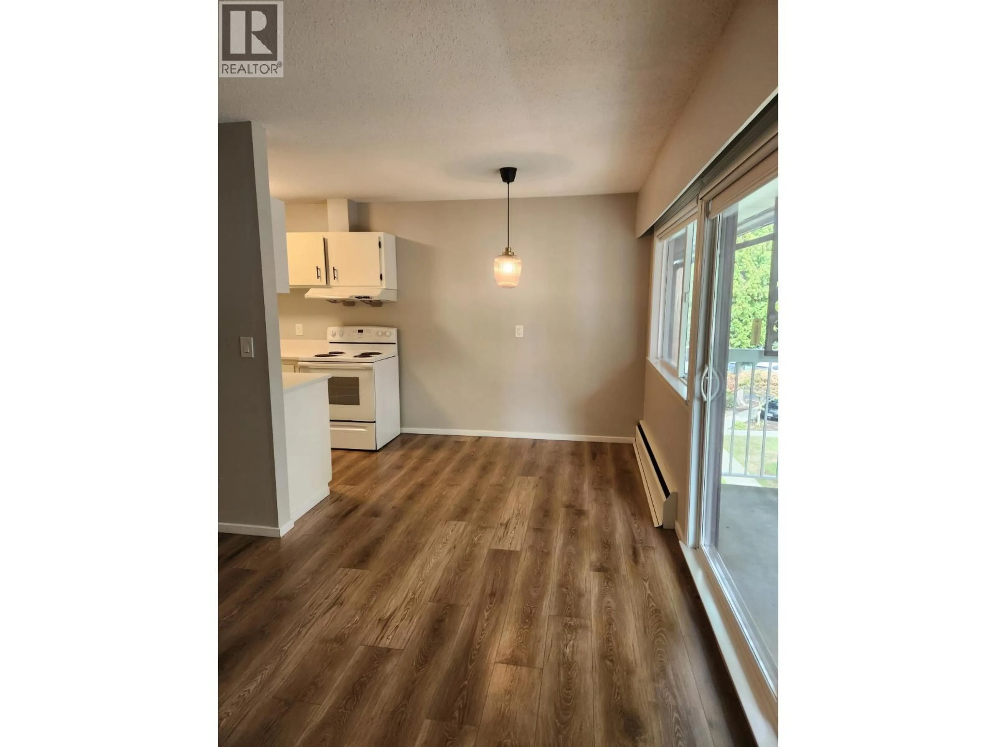 Open concept kitchen, wood/laminate floor for 306 - 8060 RYAN ROAD, Richmond British Columbia V7A2E5
