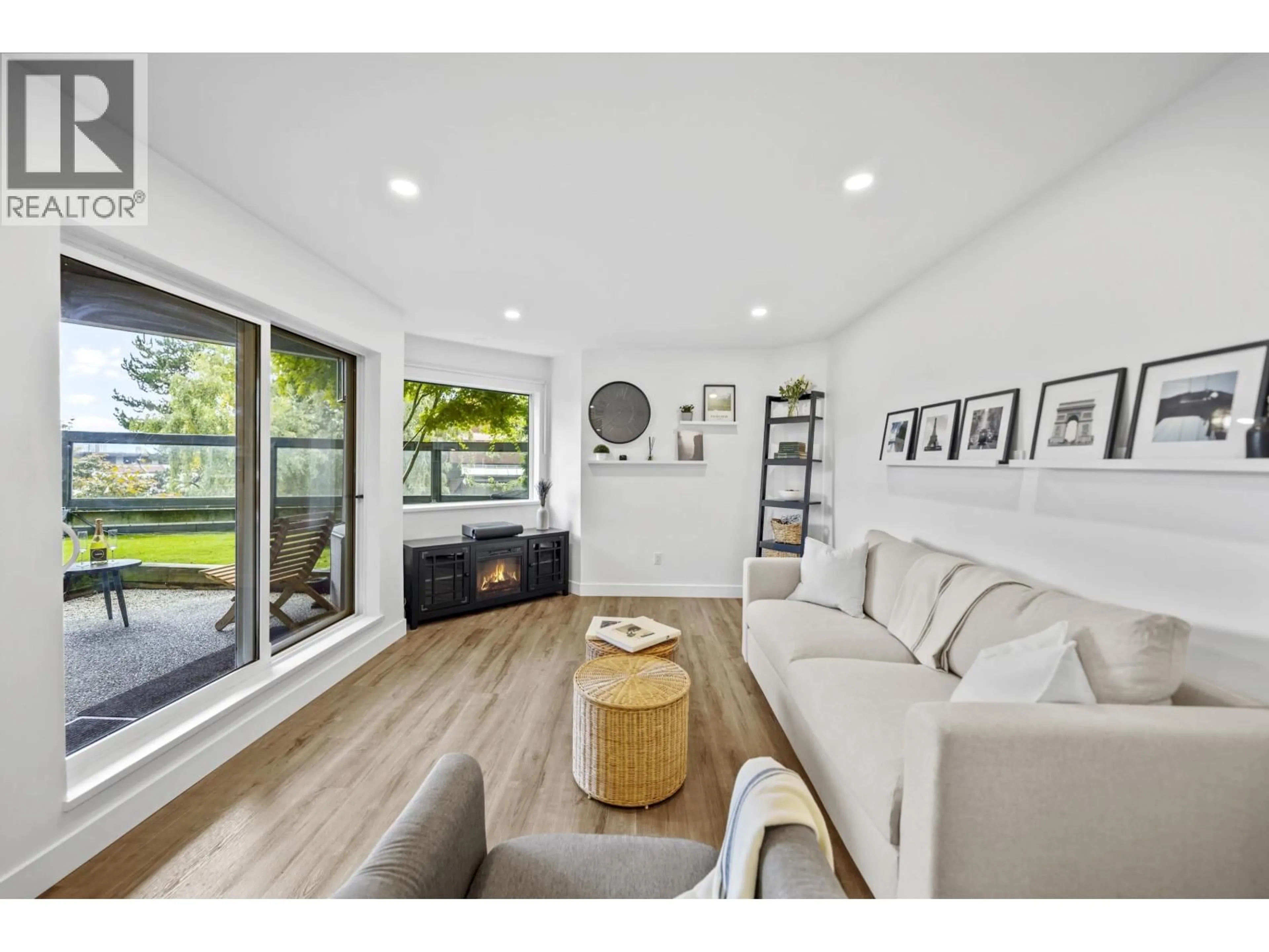 Living room with furniture, wood/laminate floor for 112 - 1345 4TH AVENUE, Vancouver British Columbia V6H3Y8