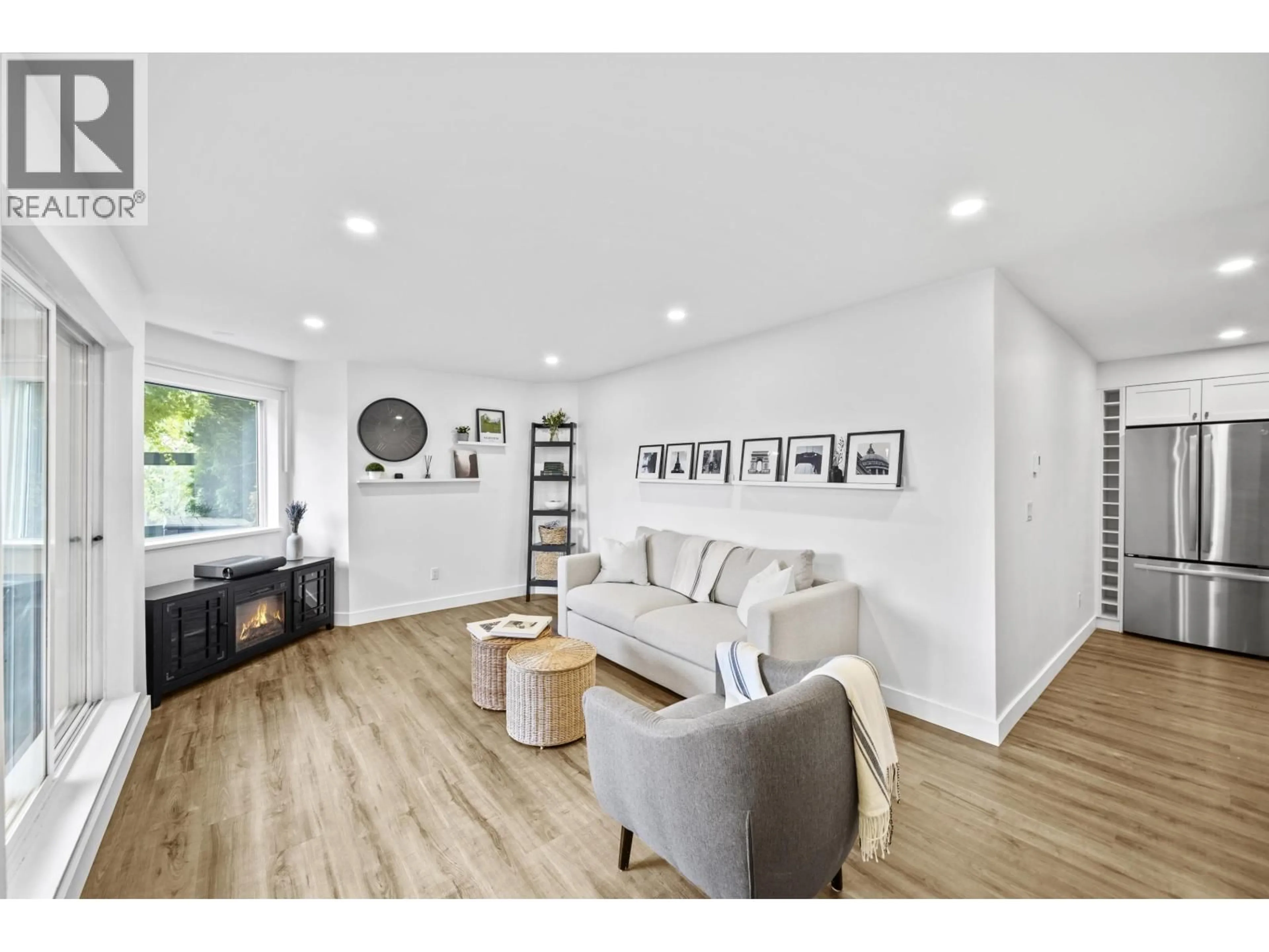 Living room with furniture, wood/laminate floor for 112 - 1345 4TH AVENUE, Vancouver British Columbia V6H3Y8