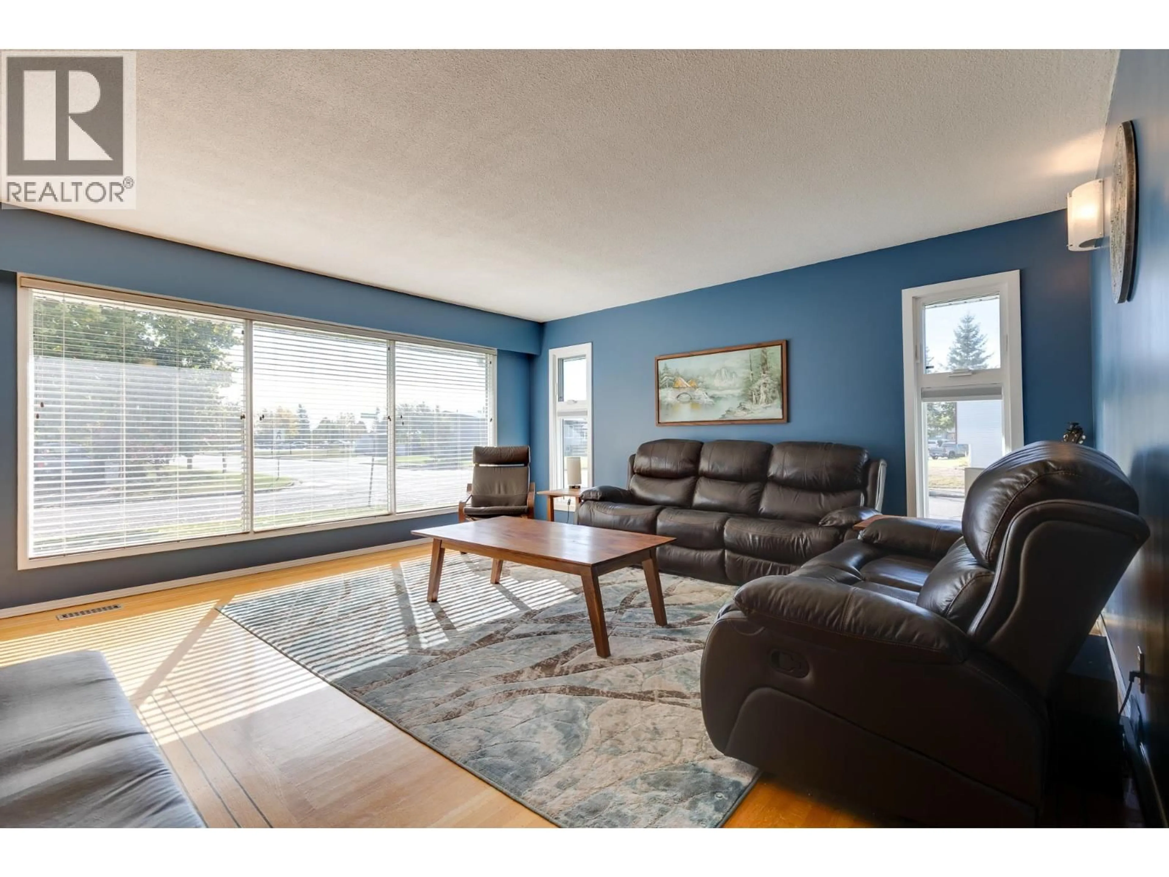 Living room with furniture, wood/laminate floor for 172 PARKER DRIVE, Prince George British Columbia V2M4S9