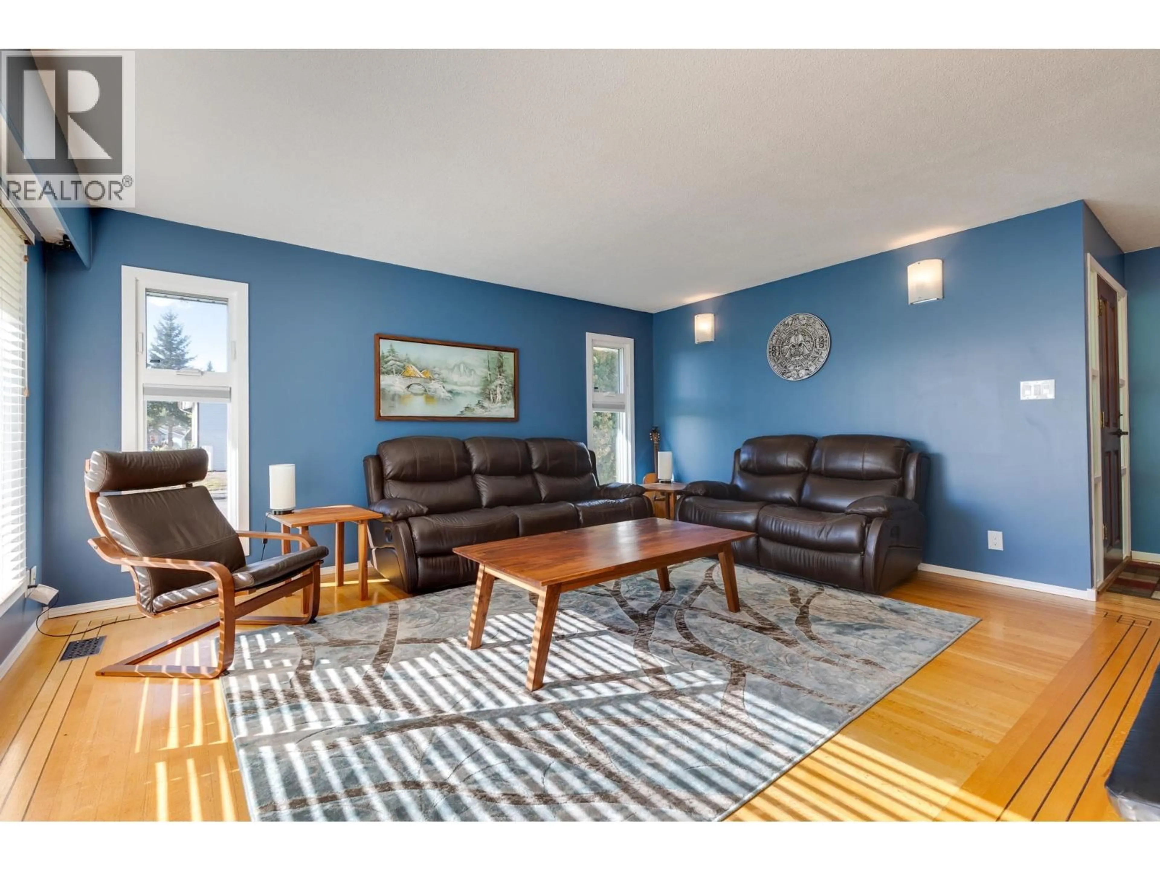 Living room with furniture, wood/laminate floor for 172 PARKER DRIVE, Prince George British Columbia V2M4S9