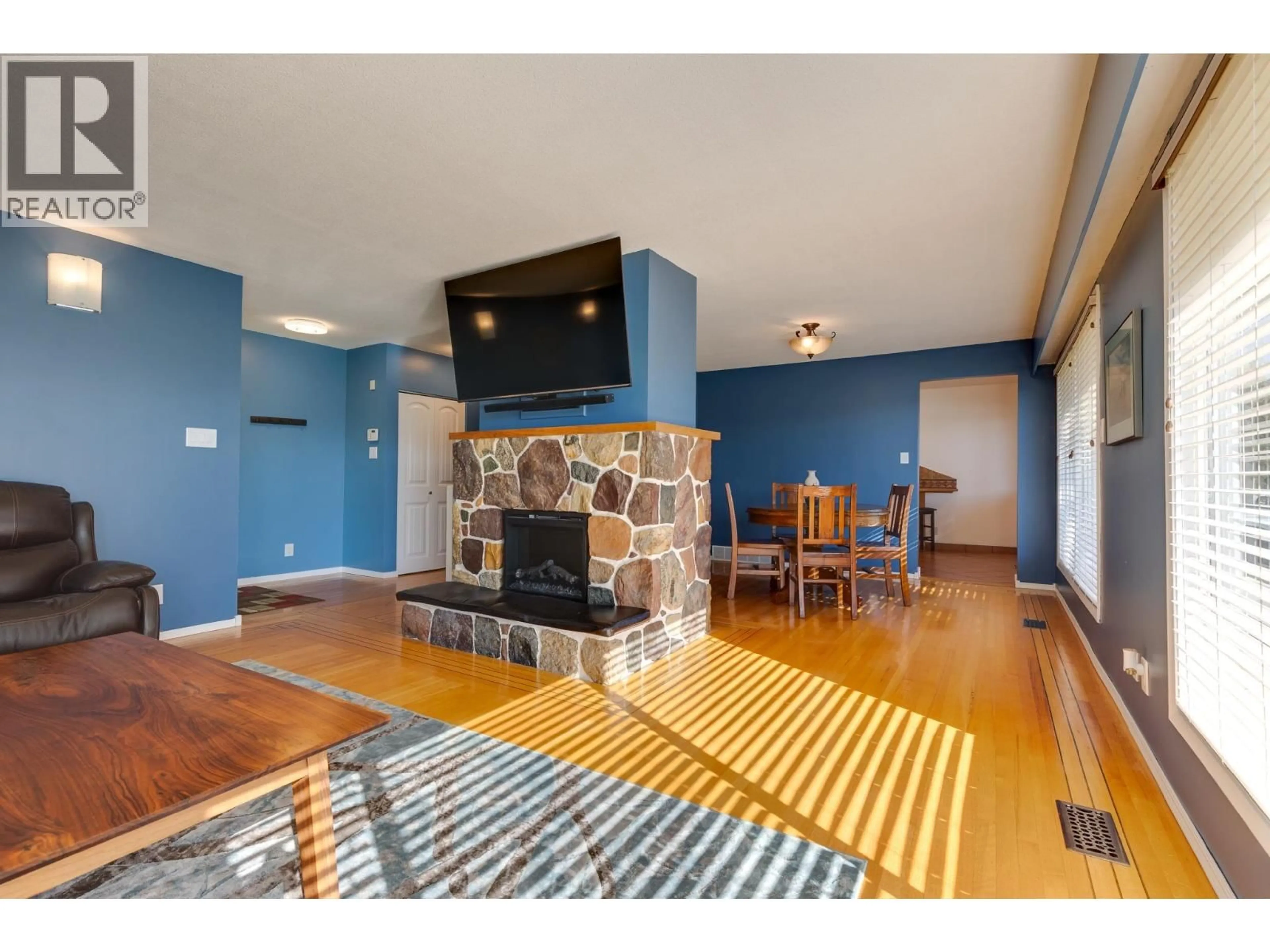 Living room with furniture, wood/laminate floor for 172 PARKER DRIVE, Prince George British Columbia V2M4S9