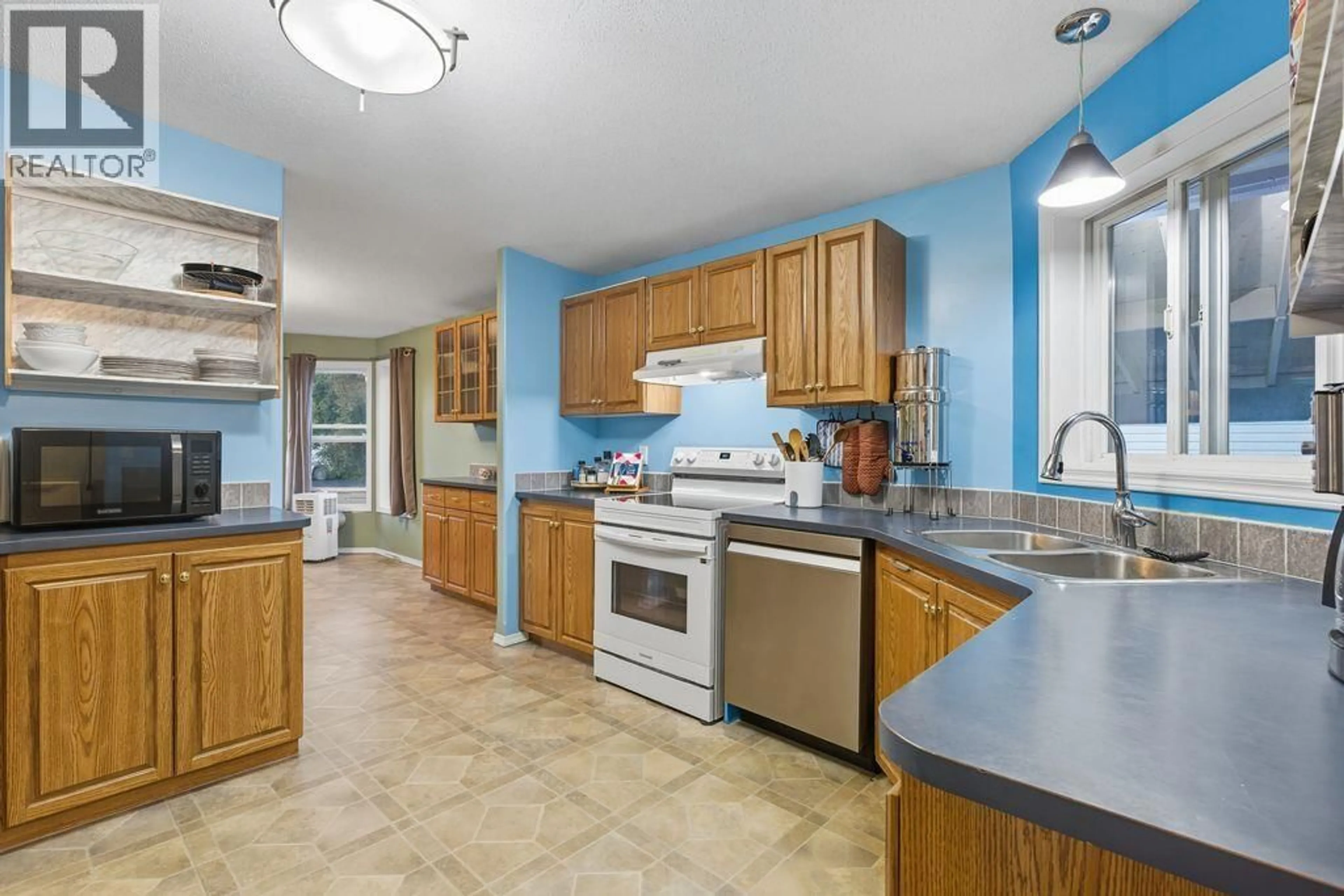 Standard kitchen, ceramic/tile floor for 214 LONGHORN DRIVE, Williams Lake British Columbia V2G4T7