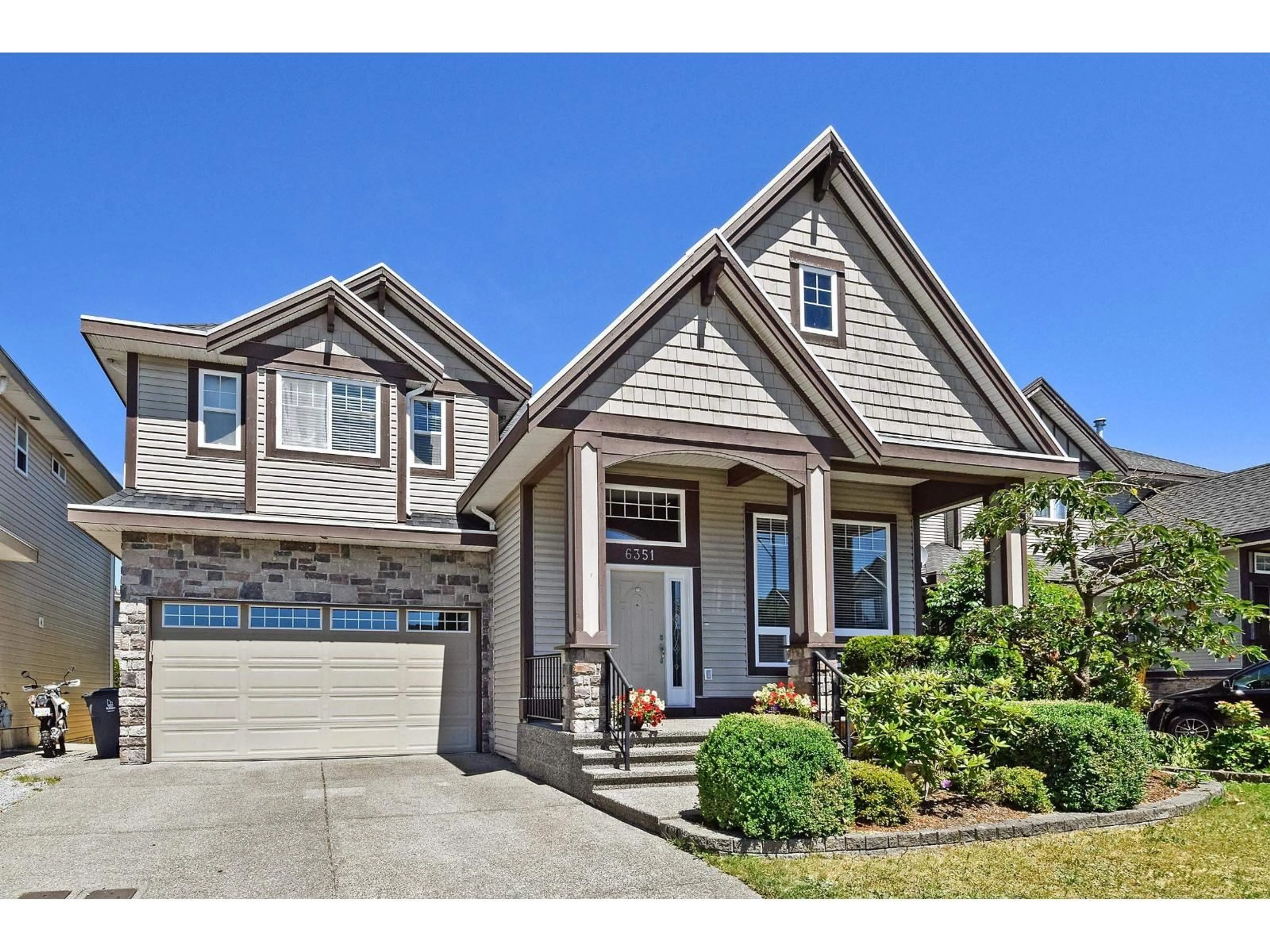Home with vinyl exterior material, street for 6351 167B, Surrey British Columbia V3S1X3
