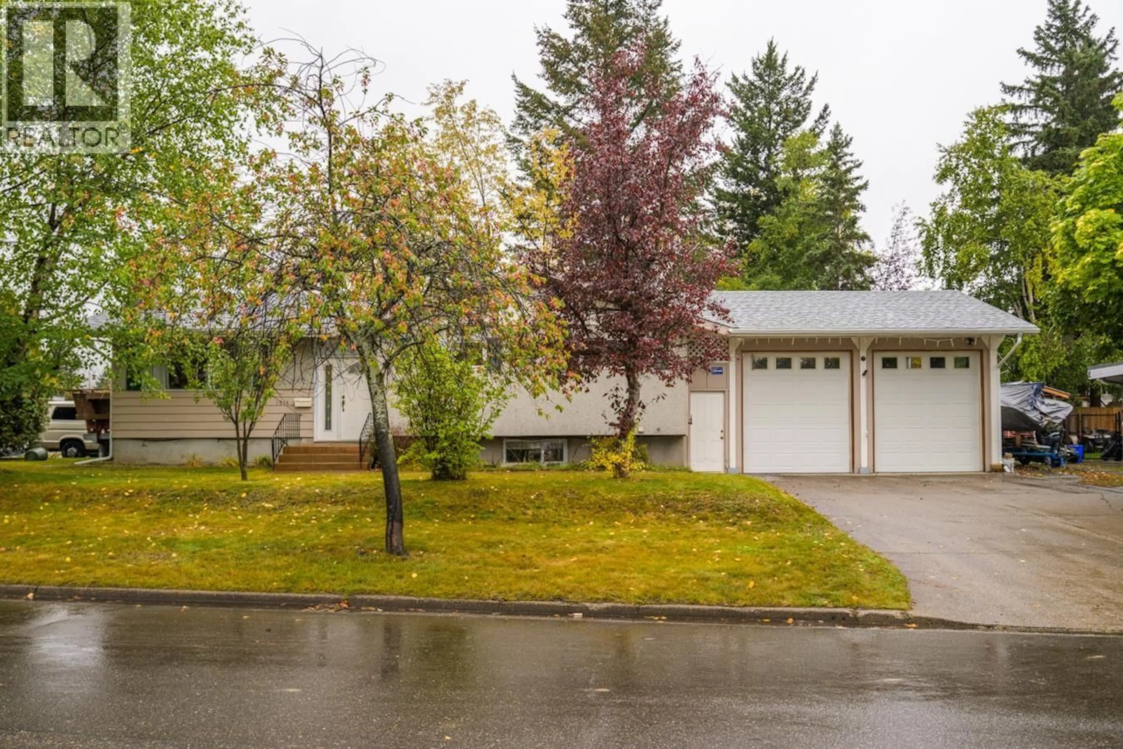 Home with vinyl exterior material, street for 1214 POWELL AVENUE, Prince George British Columbia V2M4C8