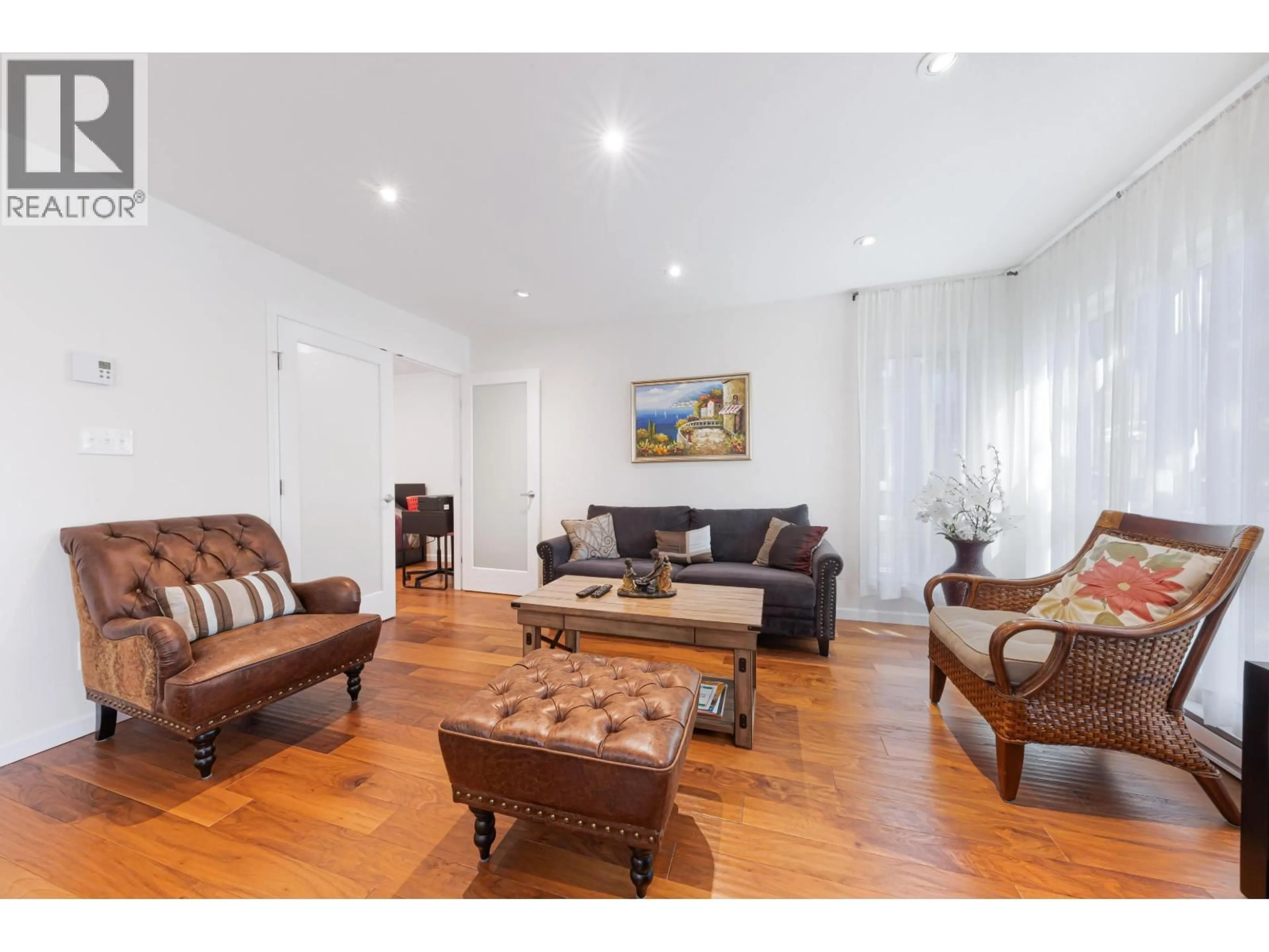 Living room with furniture, wood/laminate floor for 303 - 3950 LINWOOD STREET, Burnaby British Columbia V5G4R5