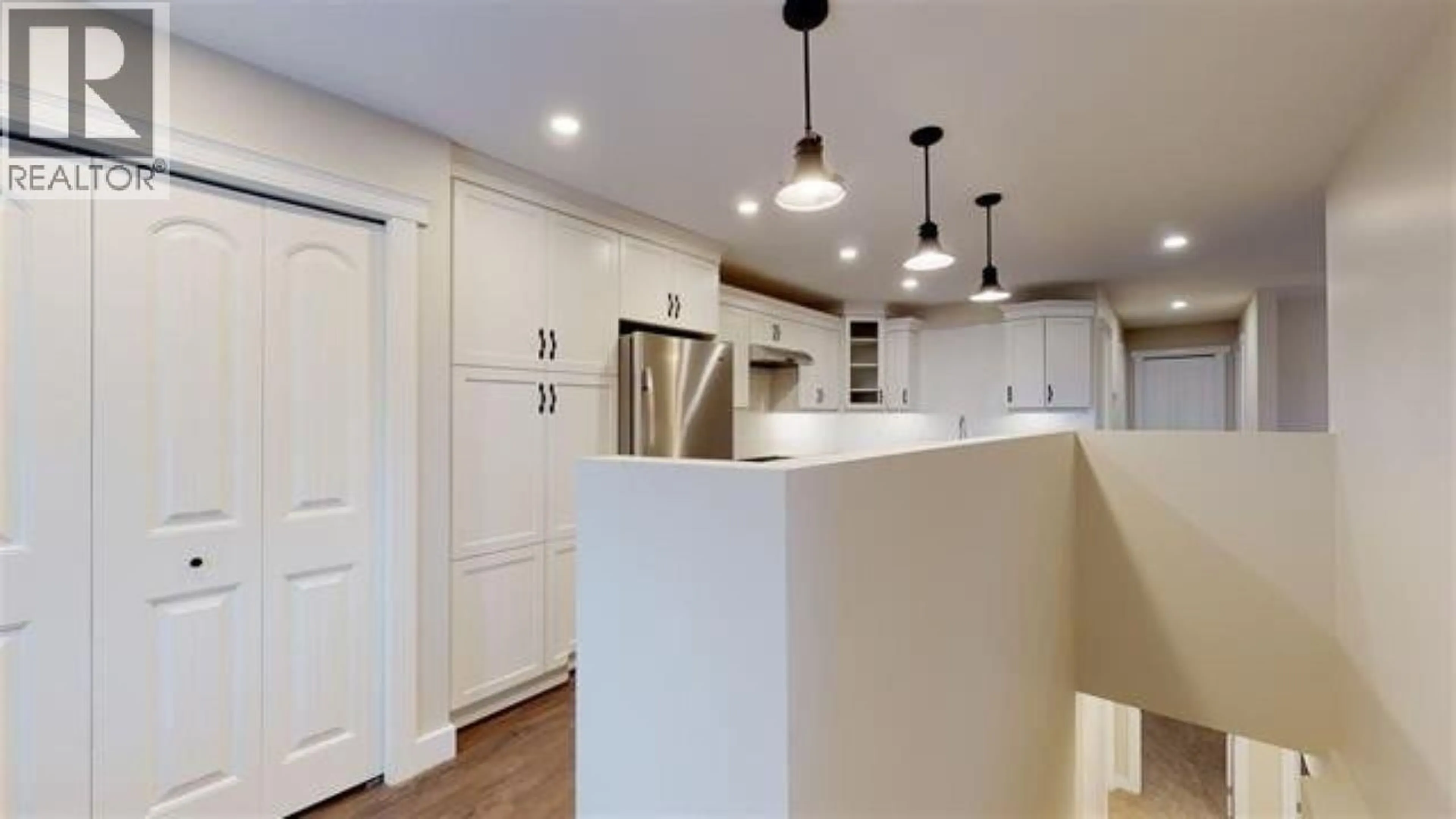 Open concept kitchen, unknown for 10416 104 STREET, Fort St. John British Columbia V1J4C7