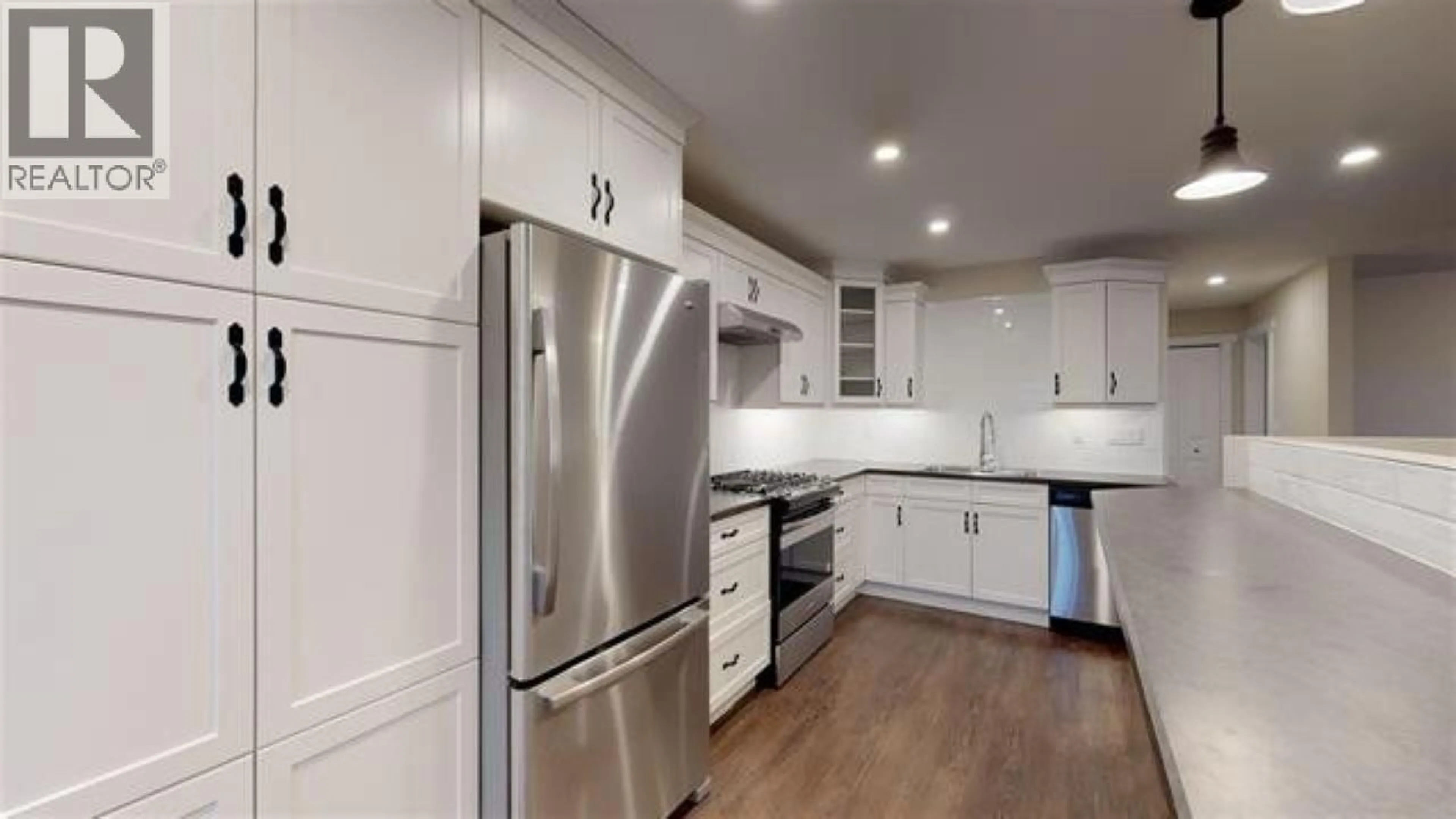 Open concept kitchen, unknown for 10416 104 STREET, Fort St. John British Columbia V1J4C7