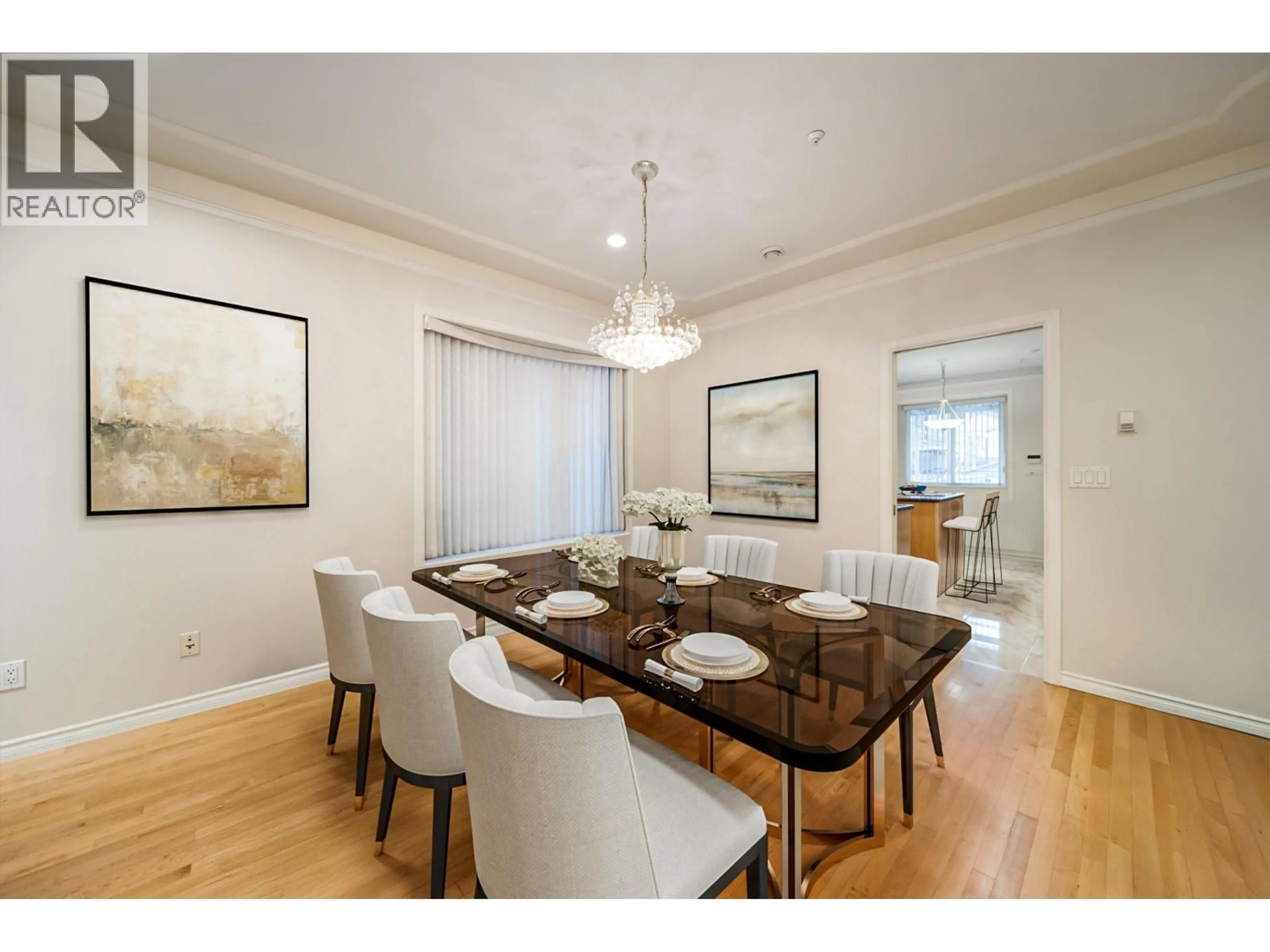 Dining room, wood/laminate floor for 5470 WALES STREET, Vancouver British Columbia V5R3M8