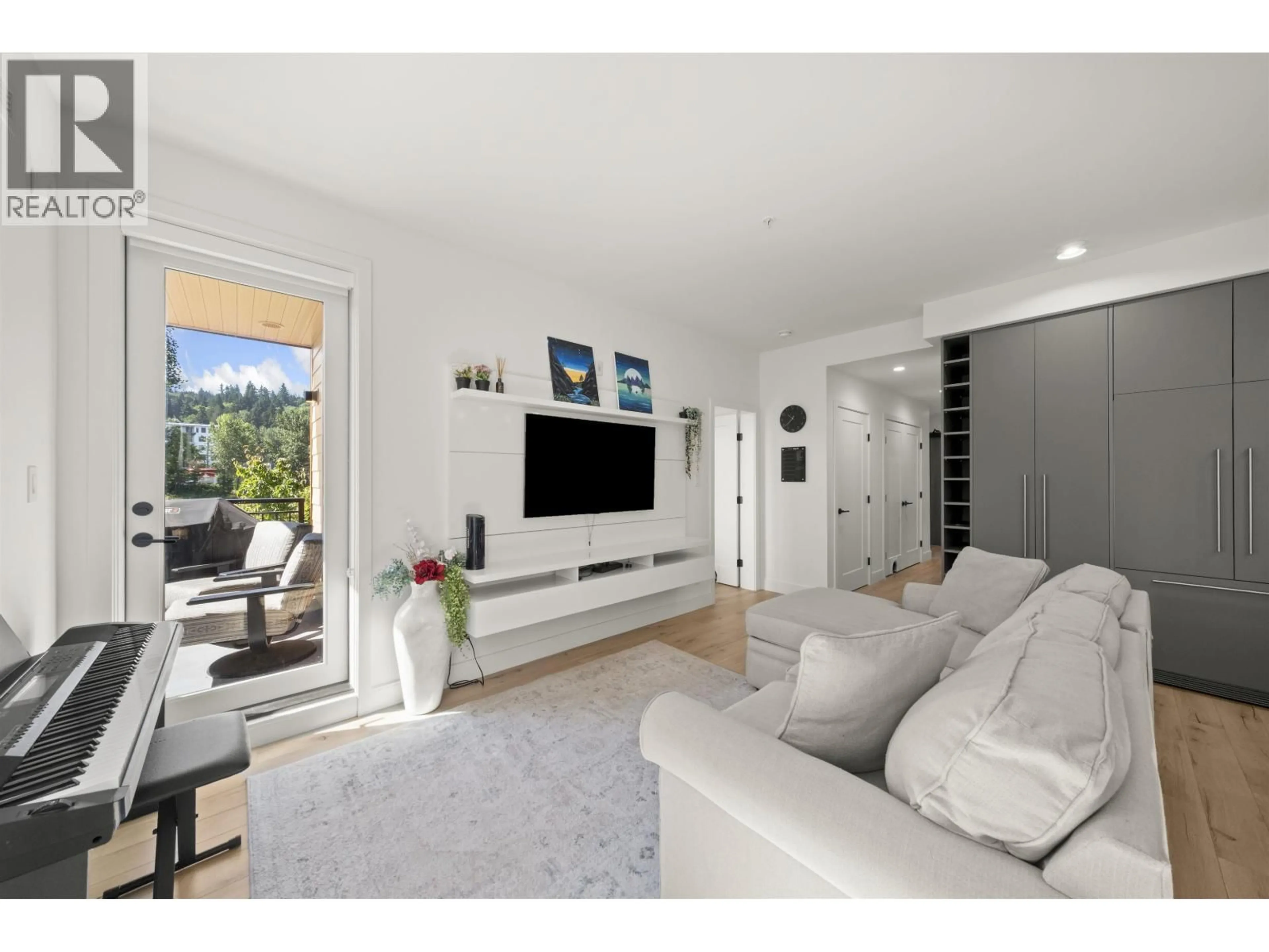 Living room with furniture, unknown for 309 - 3131 MURRAY STREET, Port Moody British Columbia V3H0L9