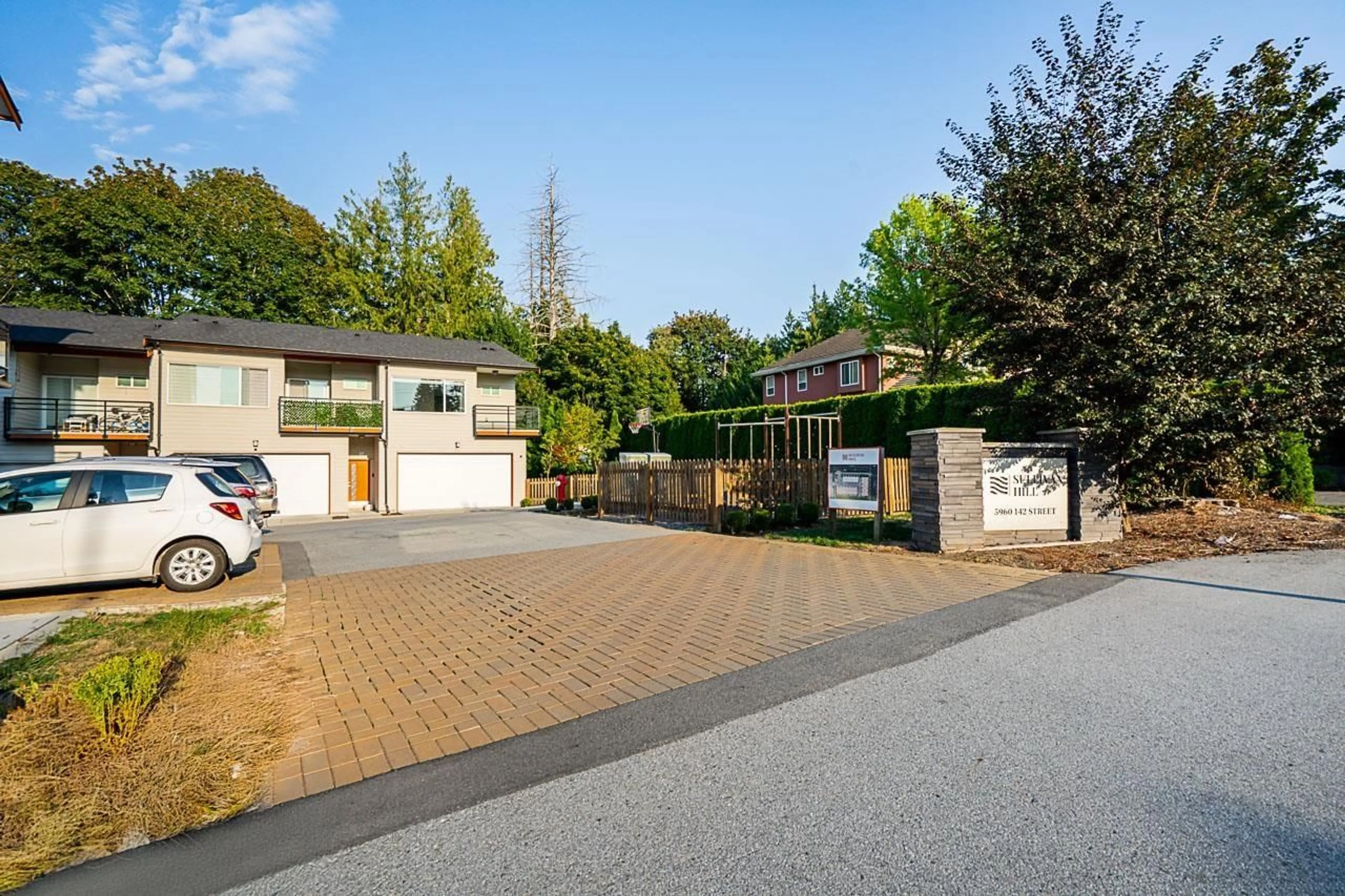 A pic from outside/outdoor area/front of a property/back of a property/a pic from drone, street for 18 - 5960 142 STREET, Surrey British Columbia V3X1C8
