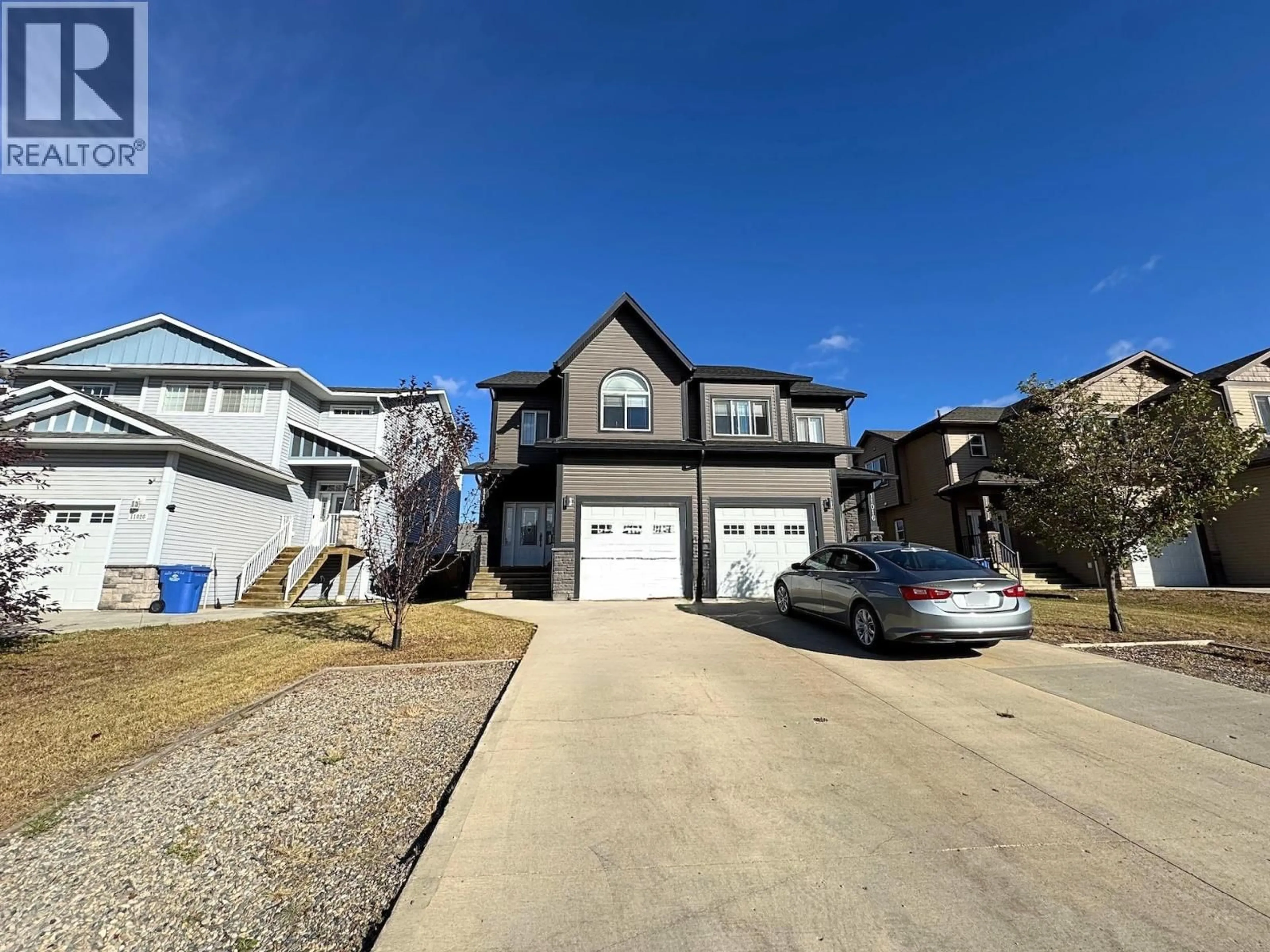 A pic from outside/outdoor area/front of a property/back of a property/a pic from drone, street for 11018 104A AVENUE, Fort St. John British Columbia V1J0J3