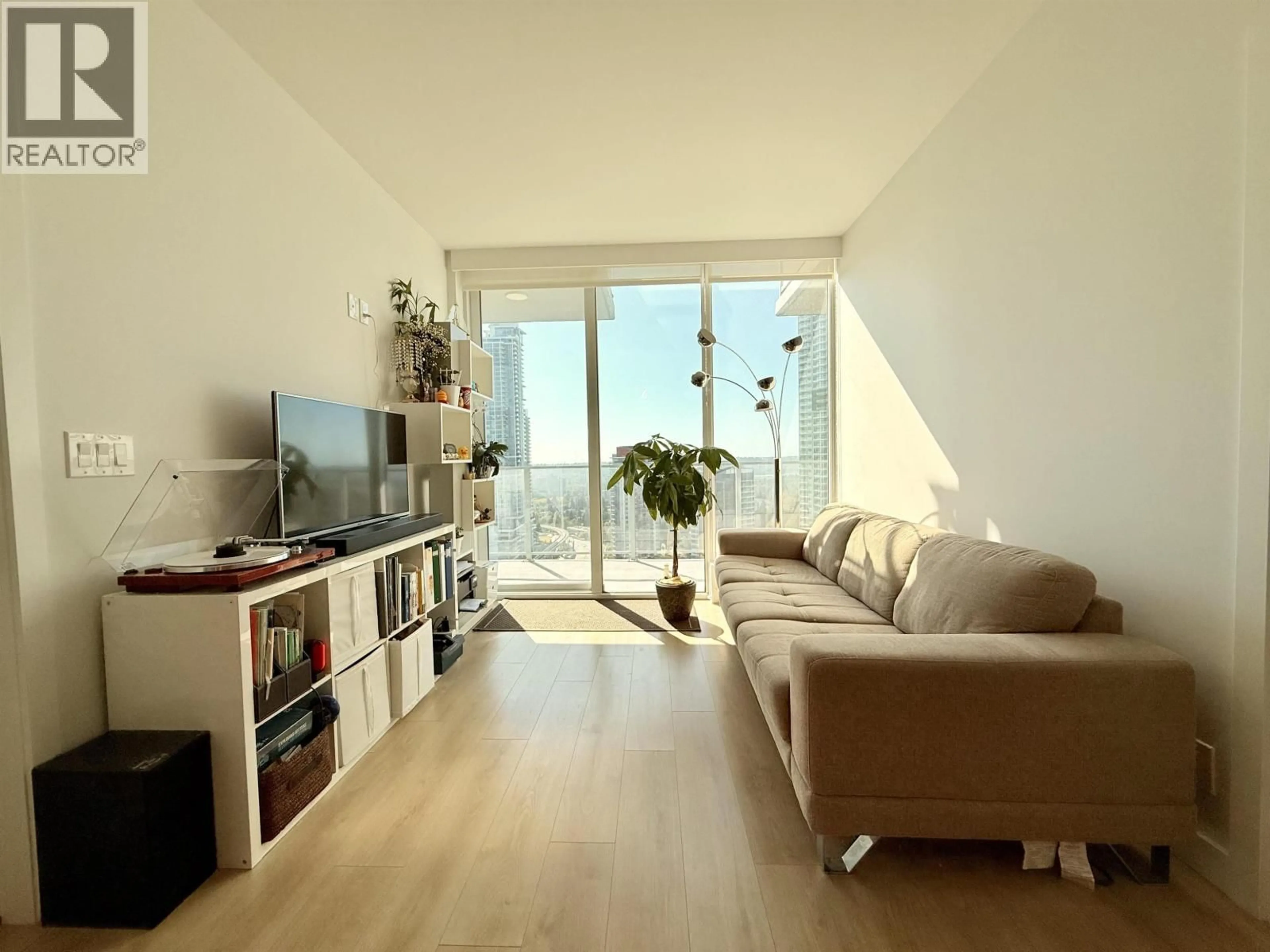 Living room with furniture, unknown for 2101 - 567 CLARKE ROAD, Coquitlam British Columbia V3J0K7