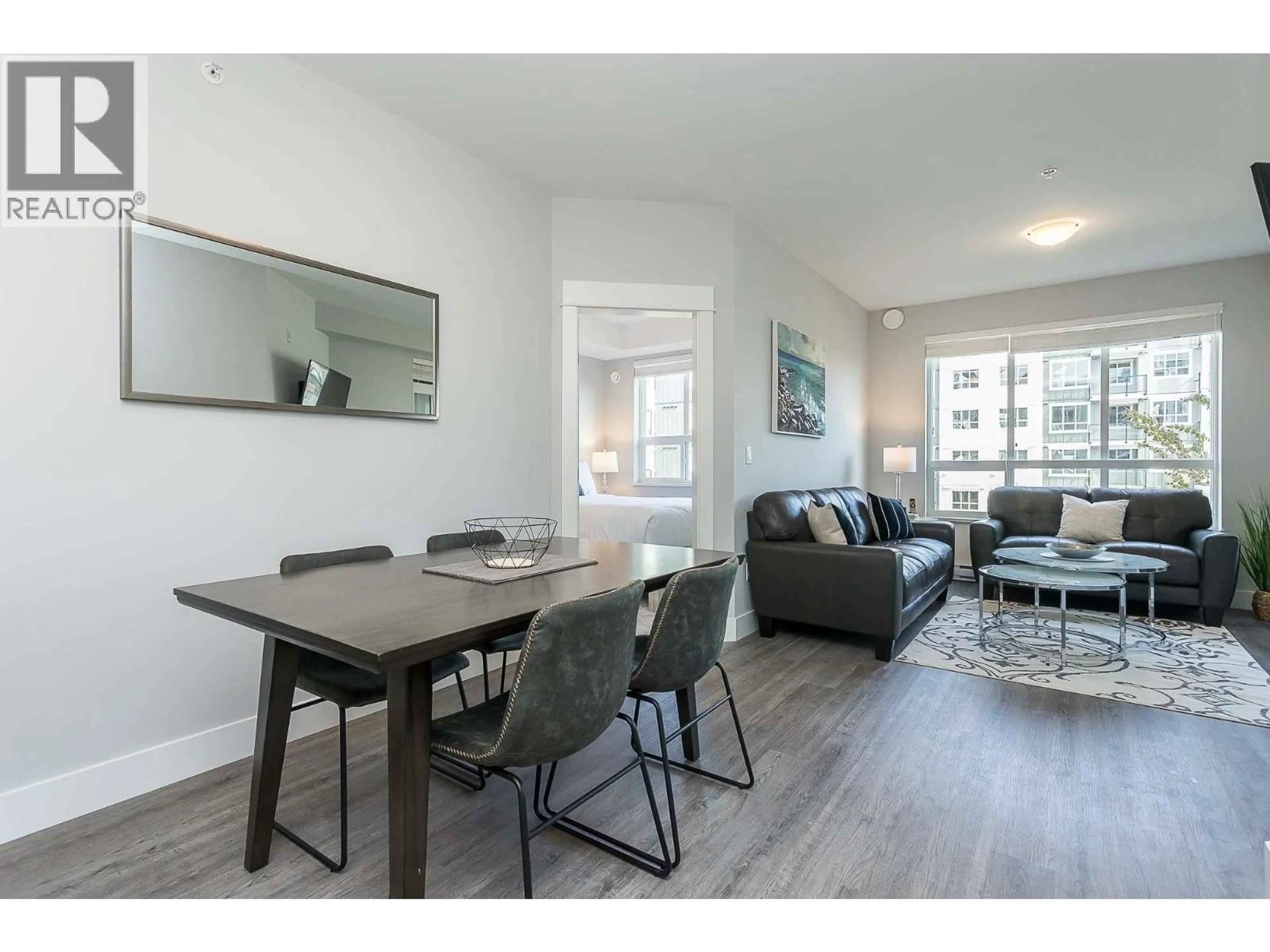 Living room with furniture, wood/laminate floor for 4317 - 2180 KELLY AVENUE, Port Coquitlam British Columbia V3C0L1