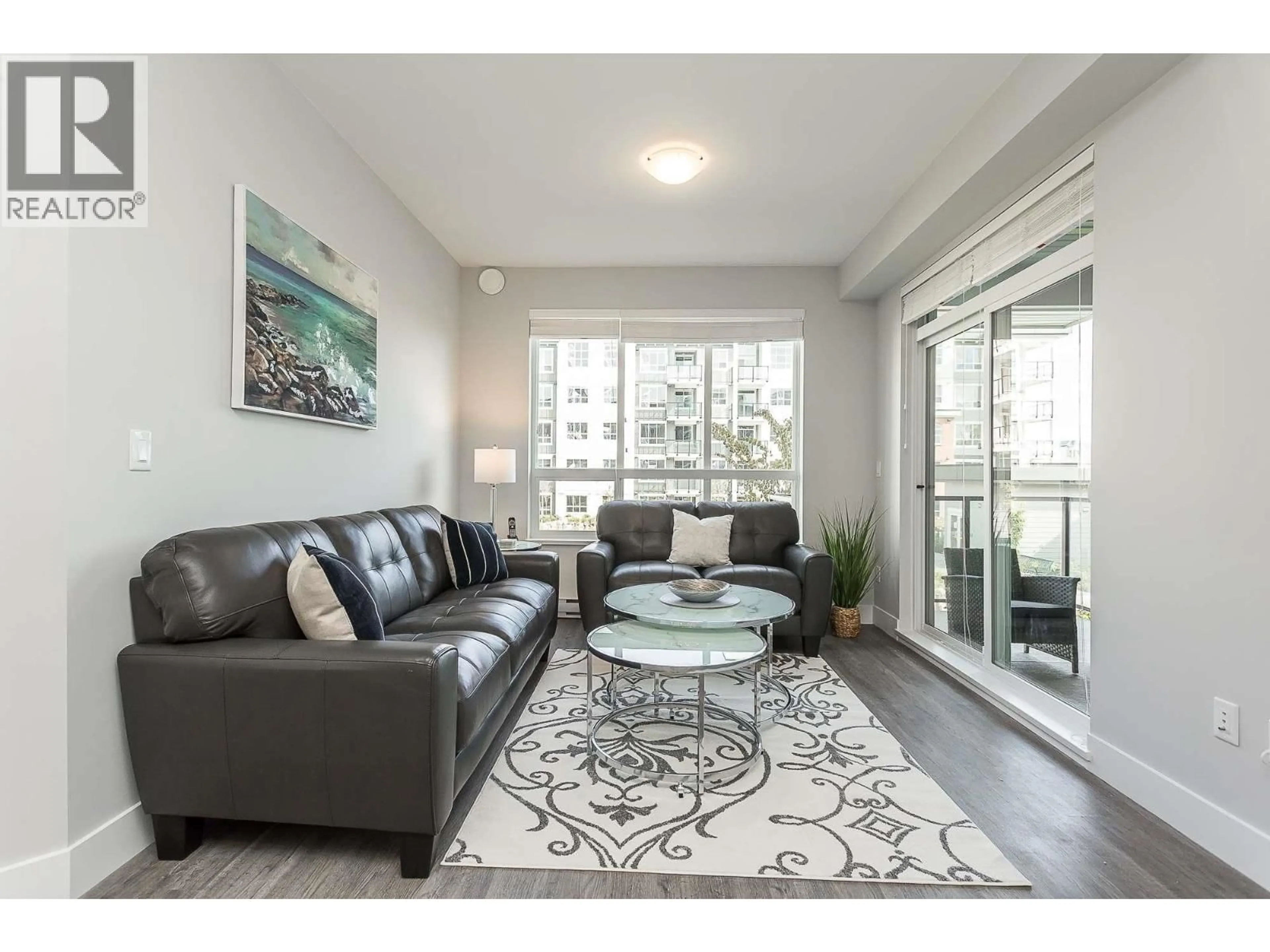 Living room with furniture, wood/laminate floor for 4317 - 2180 KELLY AVENUE, Port Coquitlam British Columbia V3C0L1
