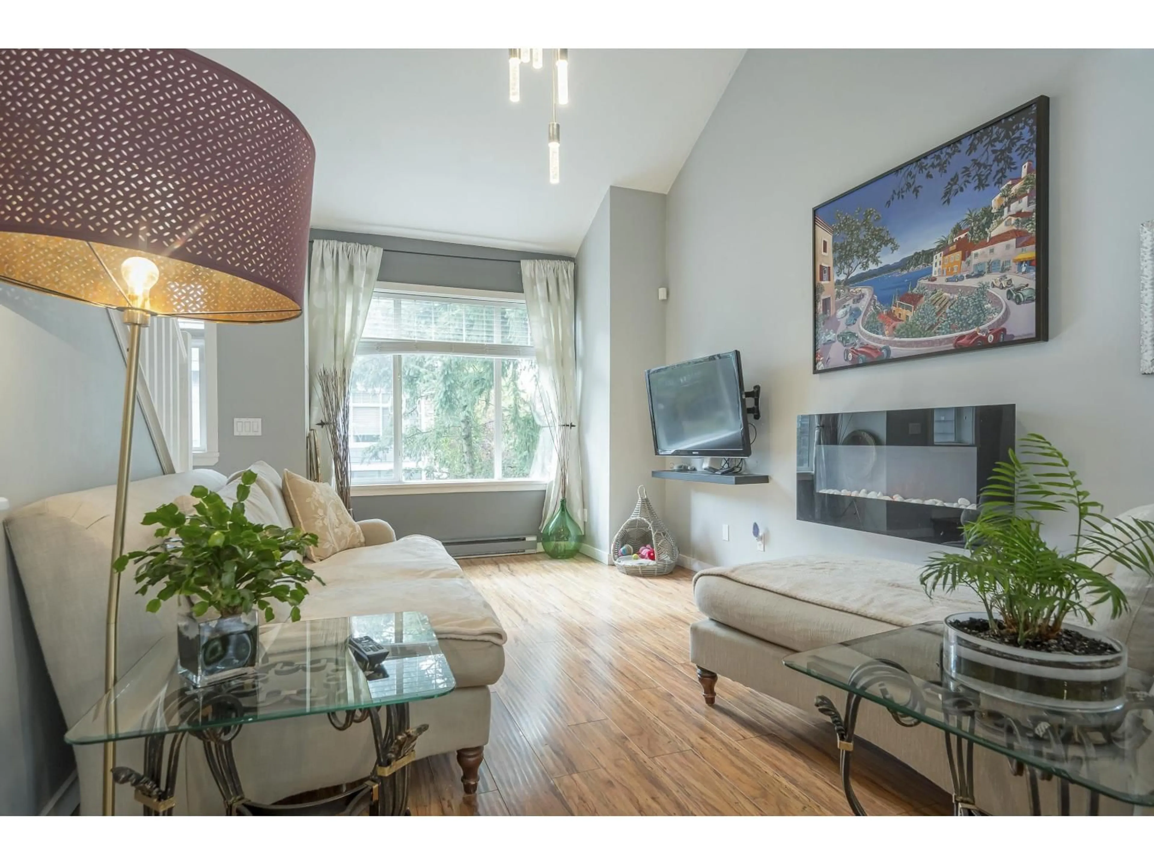 Living room with furniture, wood/laminate floor for 177 - 15236 36, Surrey British Columbia V3S2B3