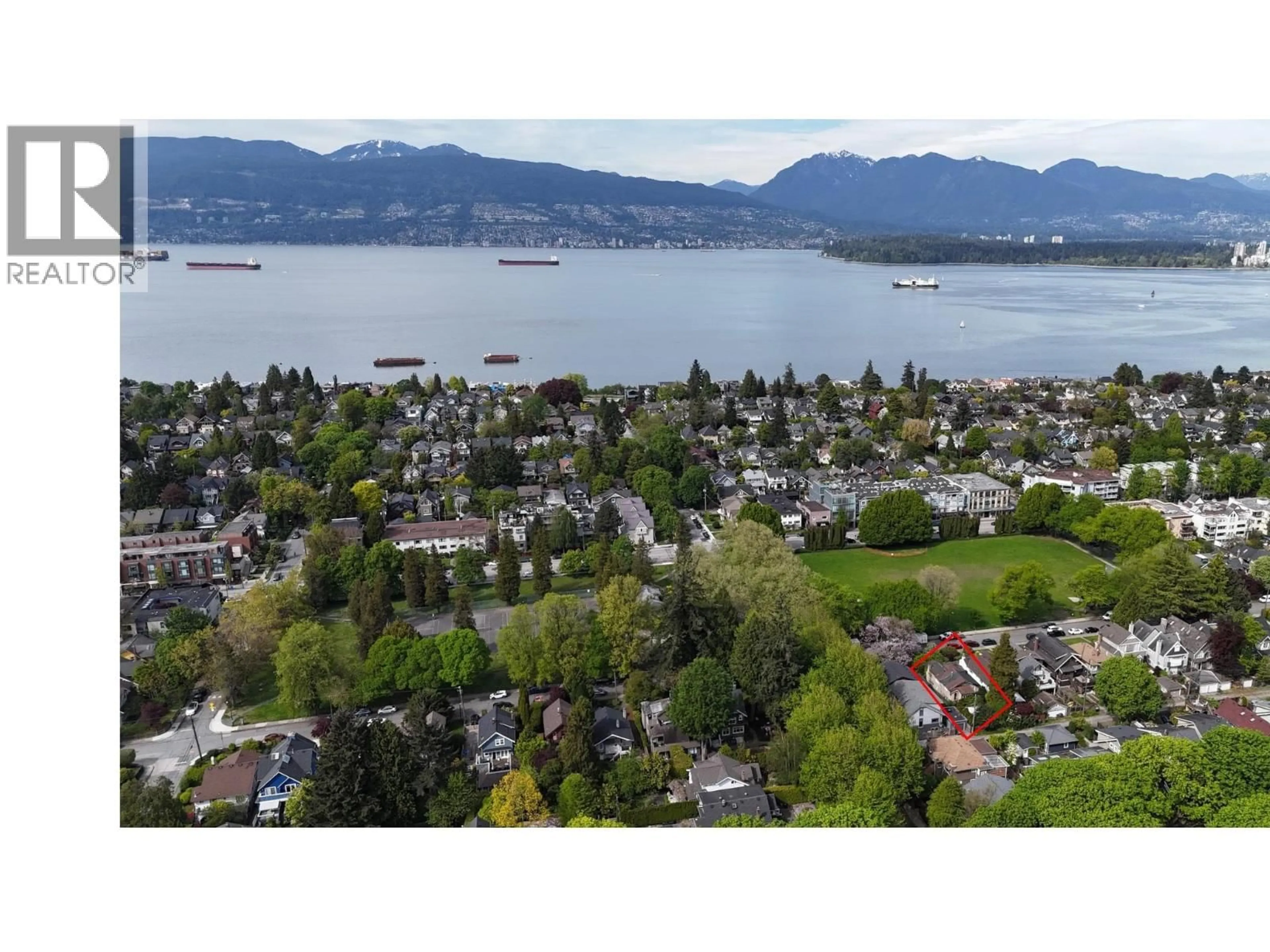 A pic from outside/outdoor area/front of a property/back of a property/a pic from drone, water/lake/river/ocean view for 3380 5TH AVENUE, Vancouver British Columbia V6R1R7