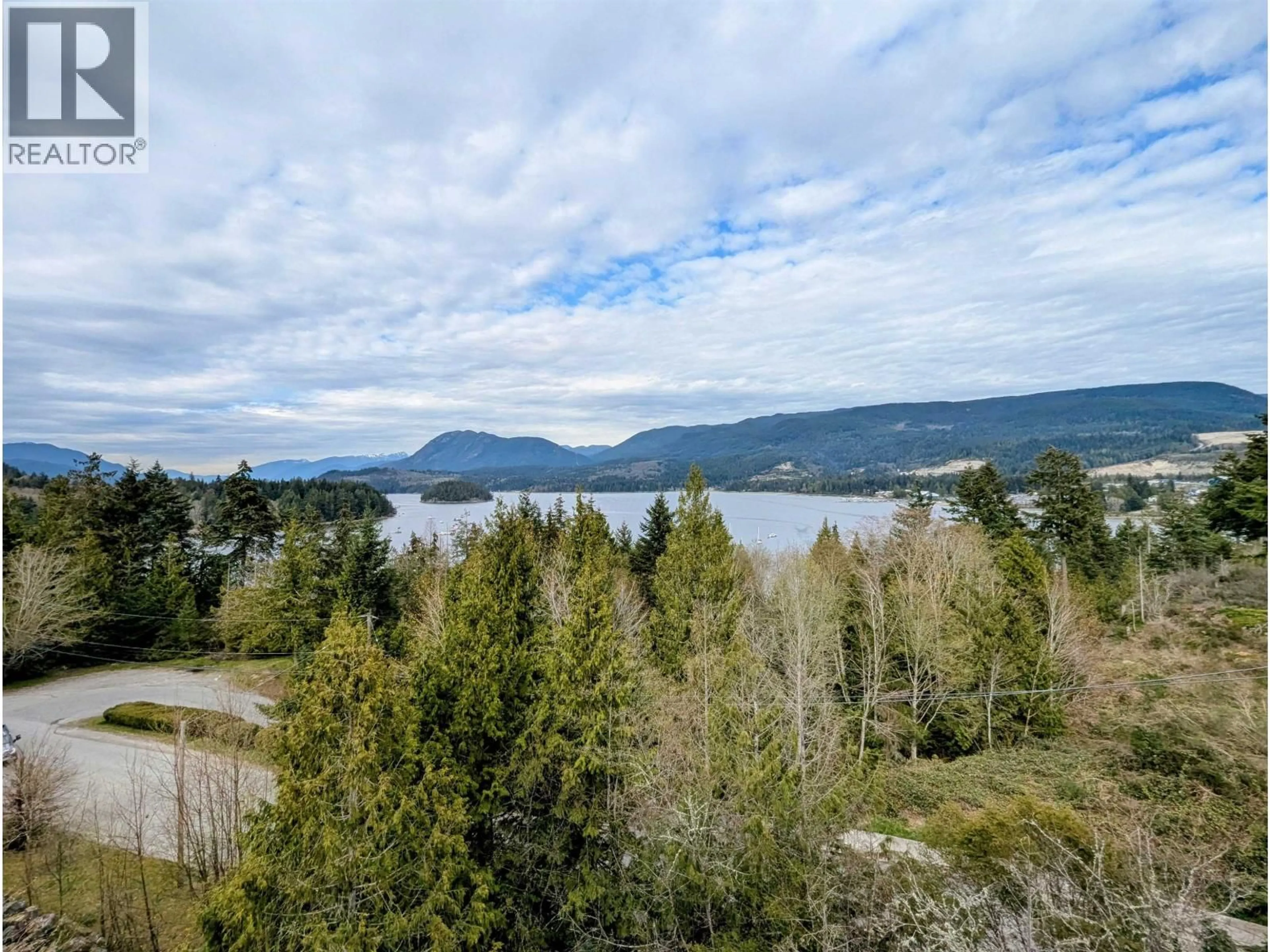 A pic from outside/outdoor area/front of a property/back of a property/a pic from drone, water/lake/river/ocean view for 322 - 5780 TRAIL AVENUE, Sechelt British Columbia V7Z0K5