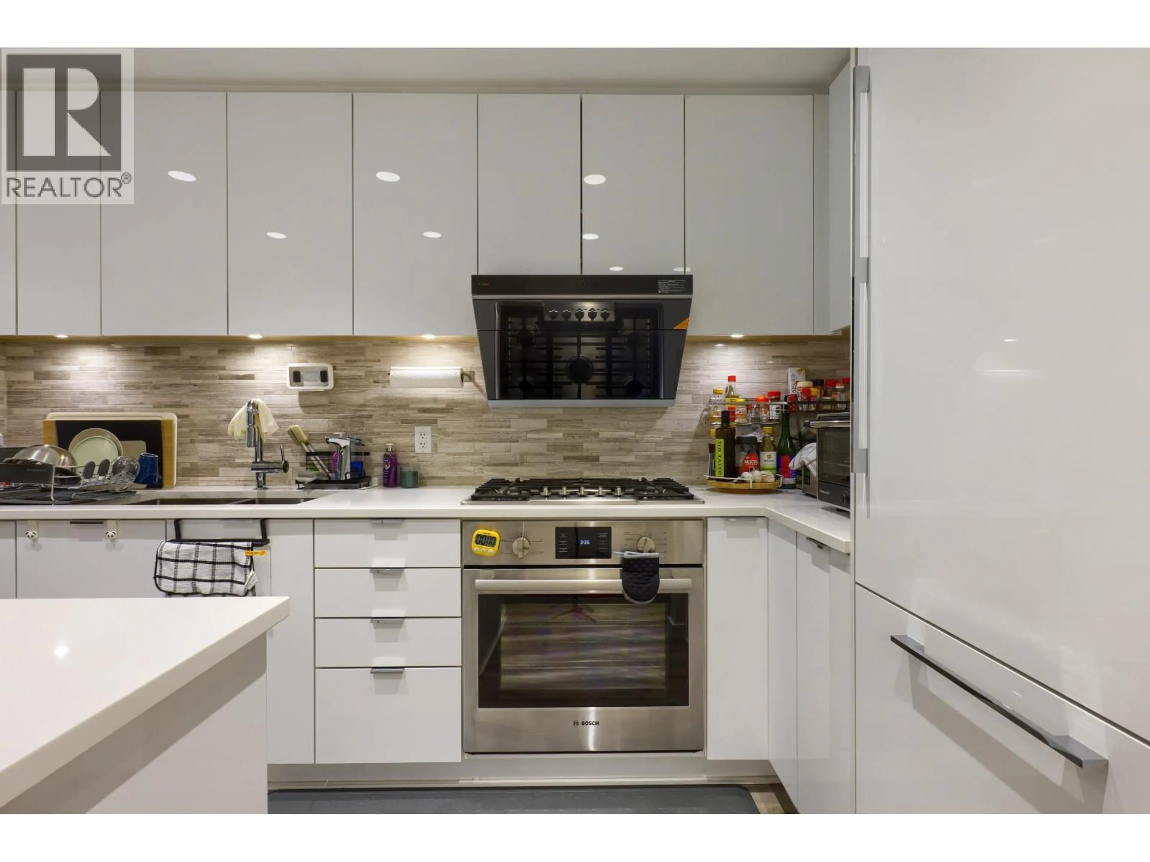 Contemporary kitchen, ceramic/tile floor for 206 - 9233 ODLIN ROAD, Richmond British Columbia V6X0V4