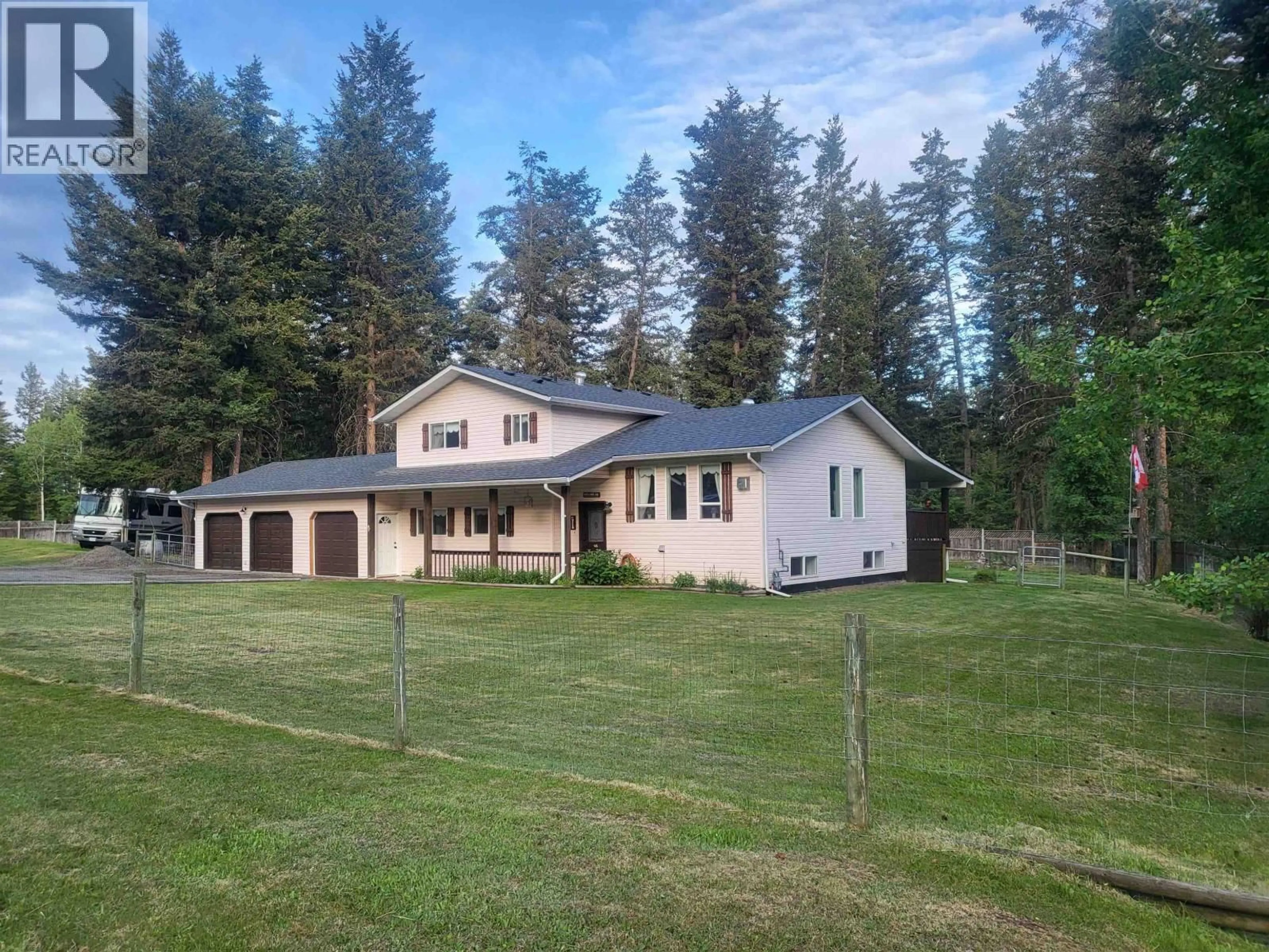 A pic from outside/outdoor area/front of a property/back of a property/a pic from drone, unknown for 4887 MEESQUONO TRAIL, 108 Mile Ranch British Columbia V0K2Z0