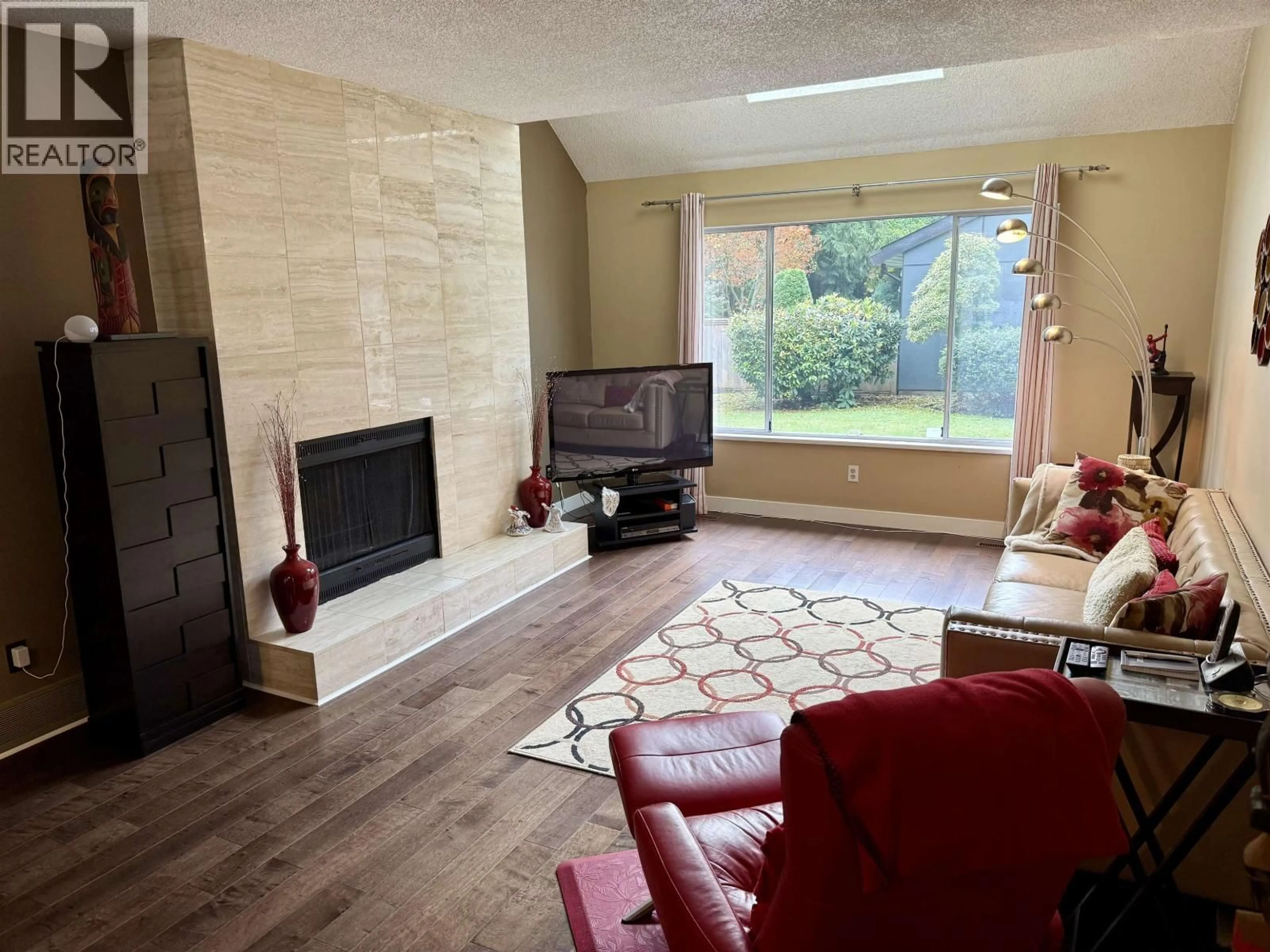 Living room with furniture, unknown for 7217 BRIDLEWOOD COURT, Burnaby British Columbia V5A4A4